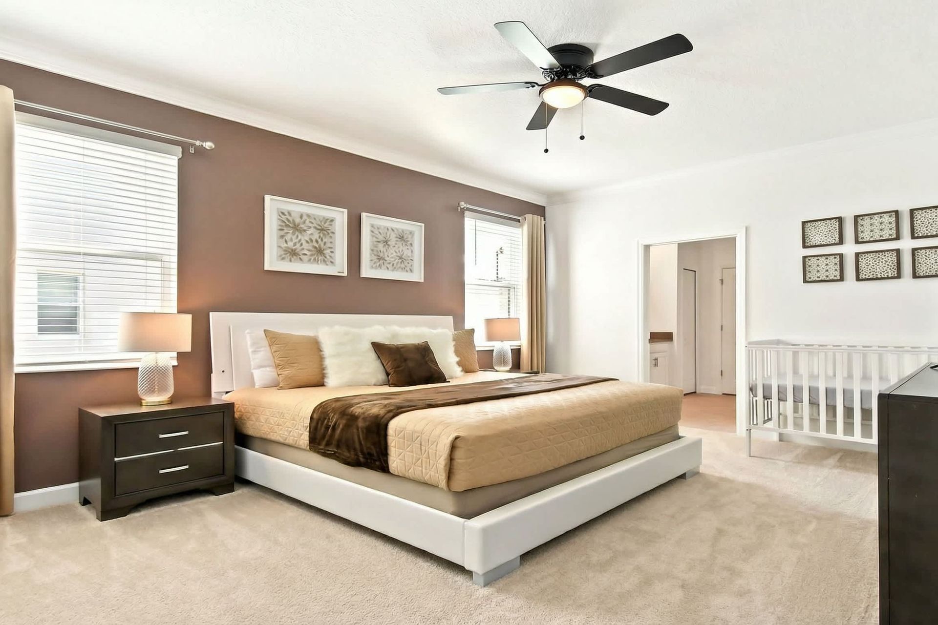 The master bedroom on the ground floor with a luxuriously large king bed.