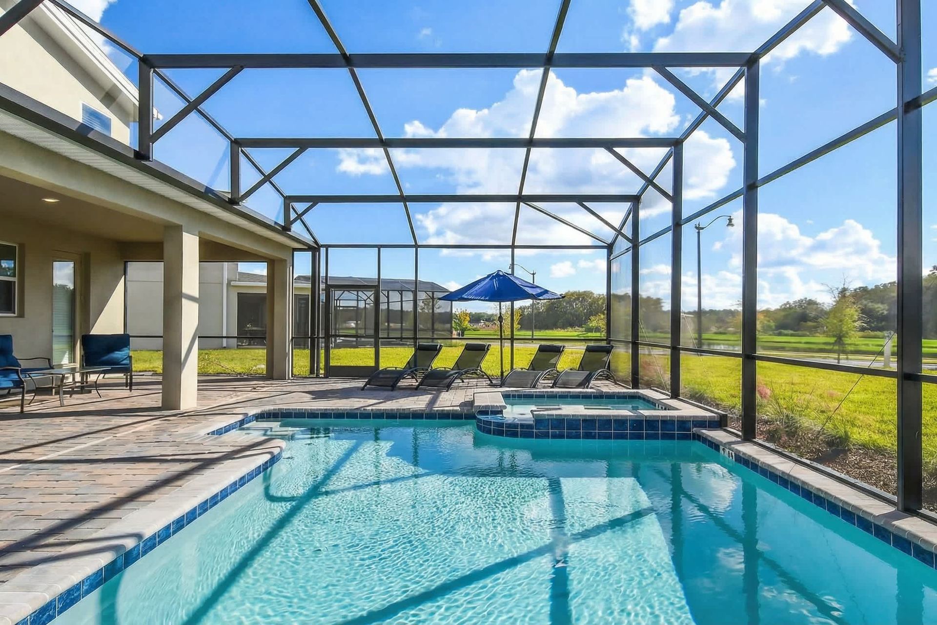 Experience the breathtaking beauty of nature with your own private pool, offering stunning views of lush green surroundings