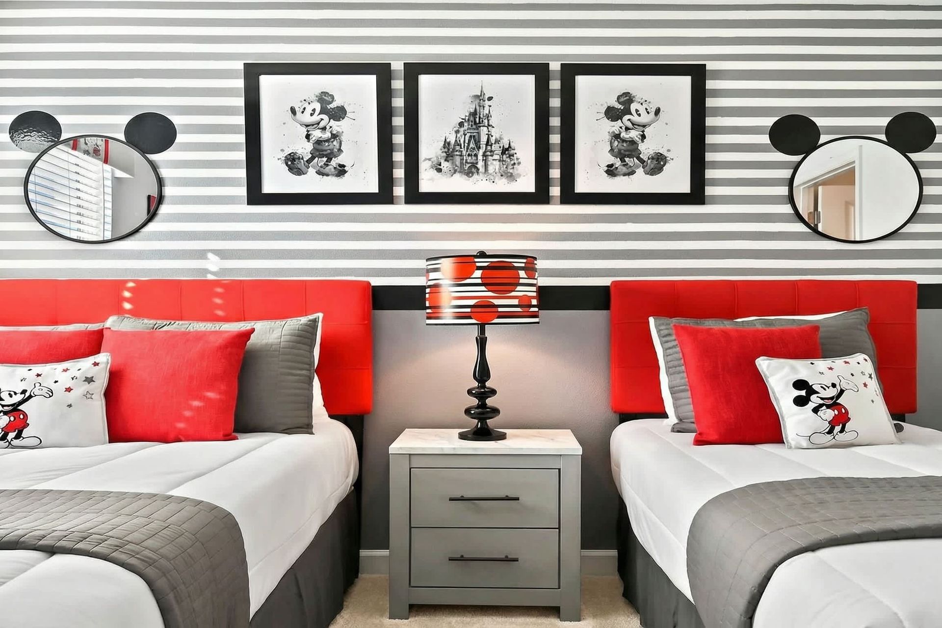 Experience the magic with a Mickey Mouse-themed bedroom, where iconic ears, vibrant colors, and playful decor bring the beloved Disney character to life.