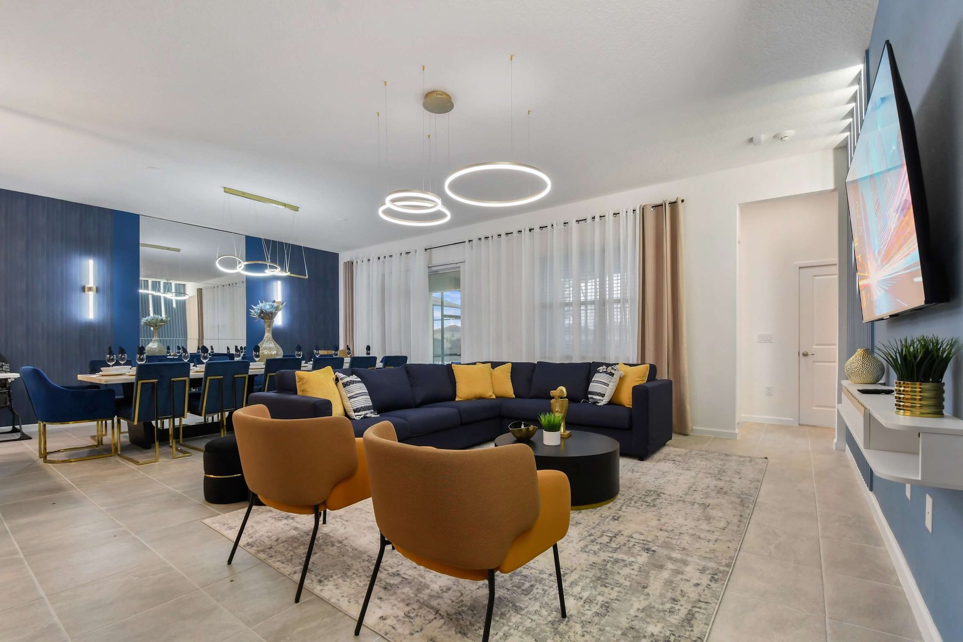 Spacious open-concept living and dining area with chic decor—entertain in style!