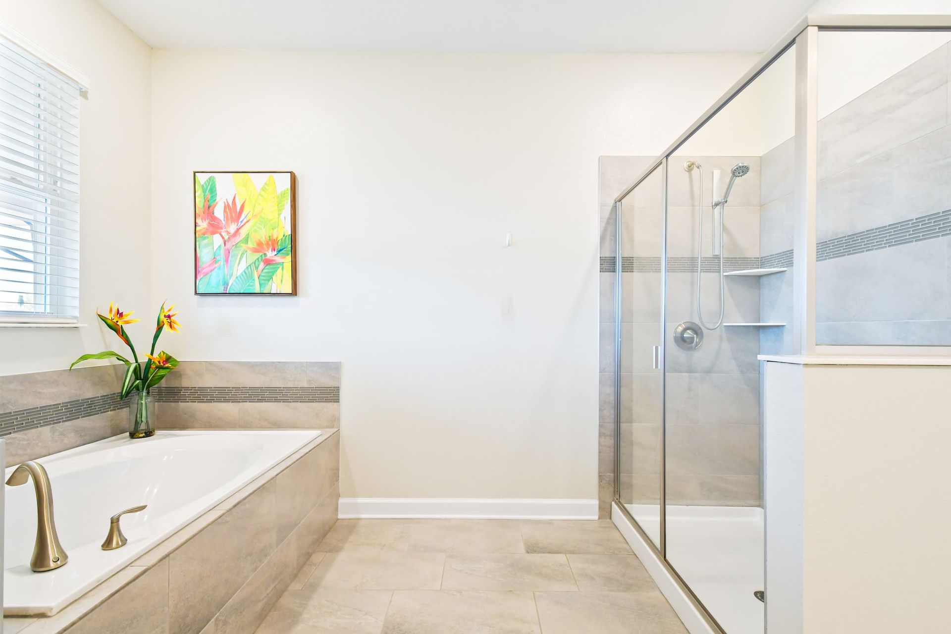 Elegant spa-like bathroom with a soaking tub, glass walk-in shower, and modern finishes