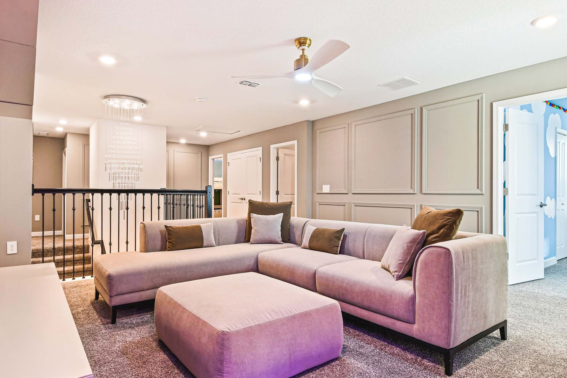 Spacious loft with a plush sectional, elegant decor, and a stylish modern design.