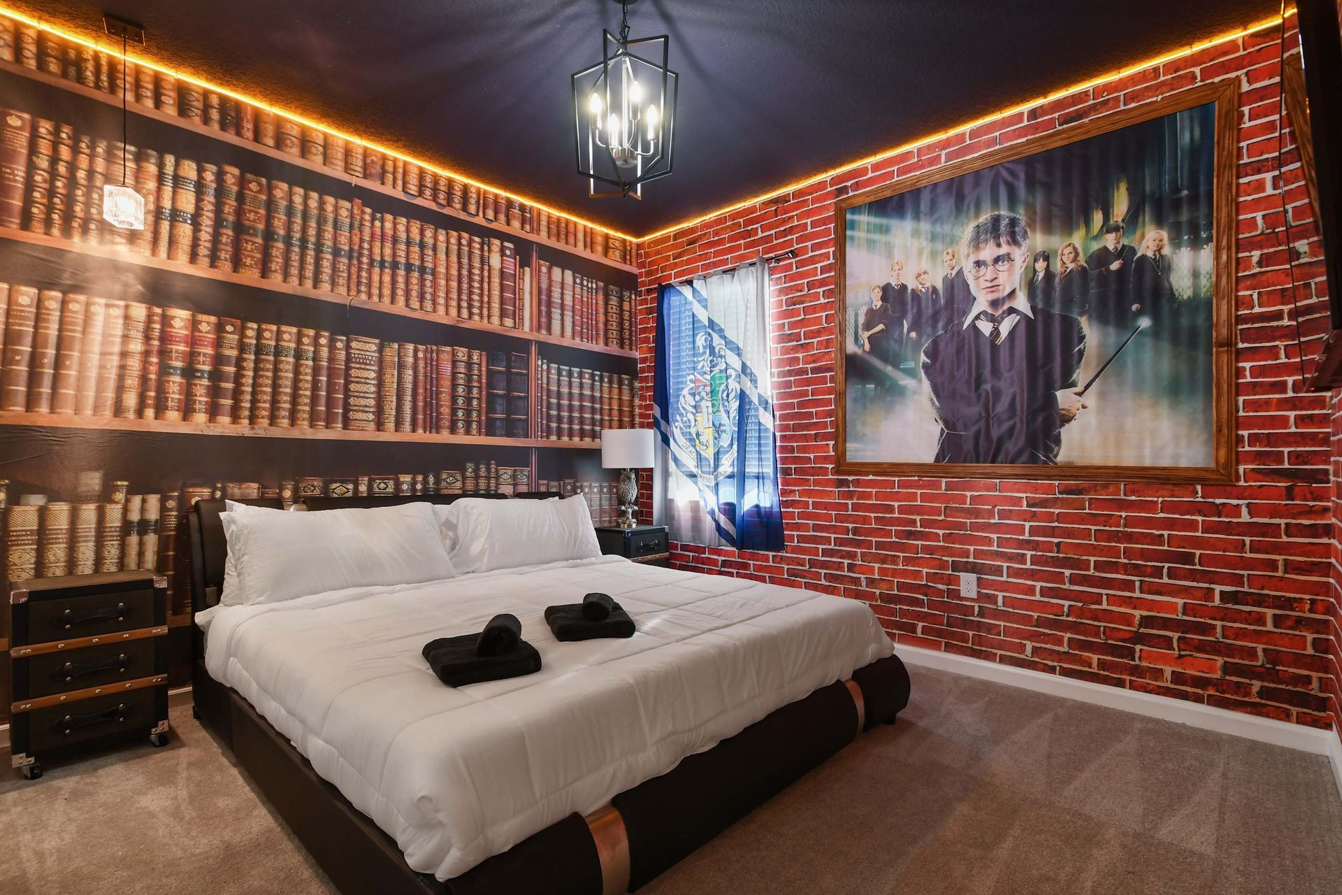 Wizard-themed king room with magical decor, book wall, and enchanting ambiance
