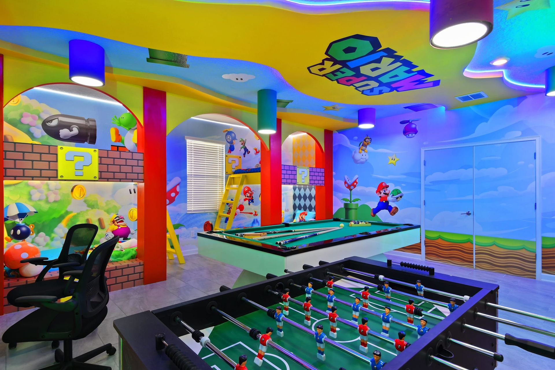 Jump into the ultimate Super Mario game room with arcades, pool, and bold colors!
