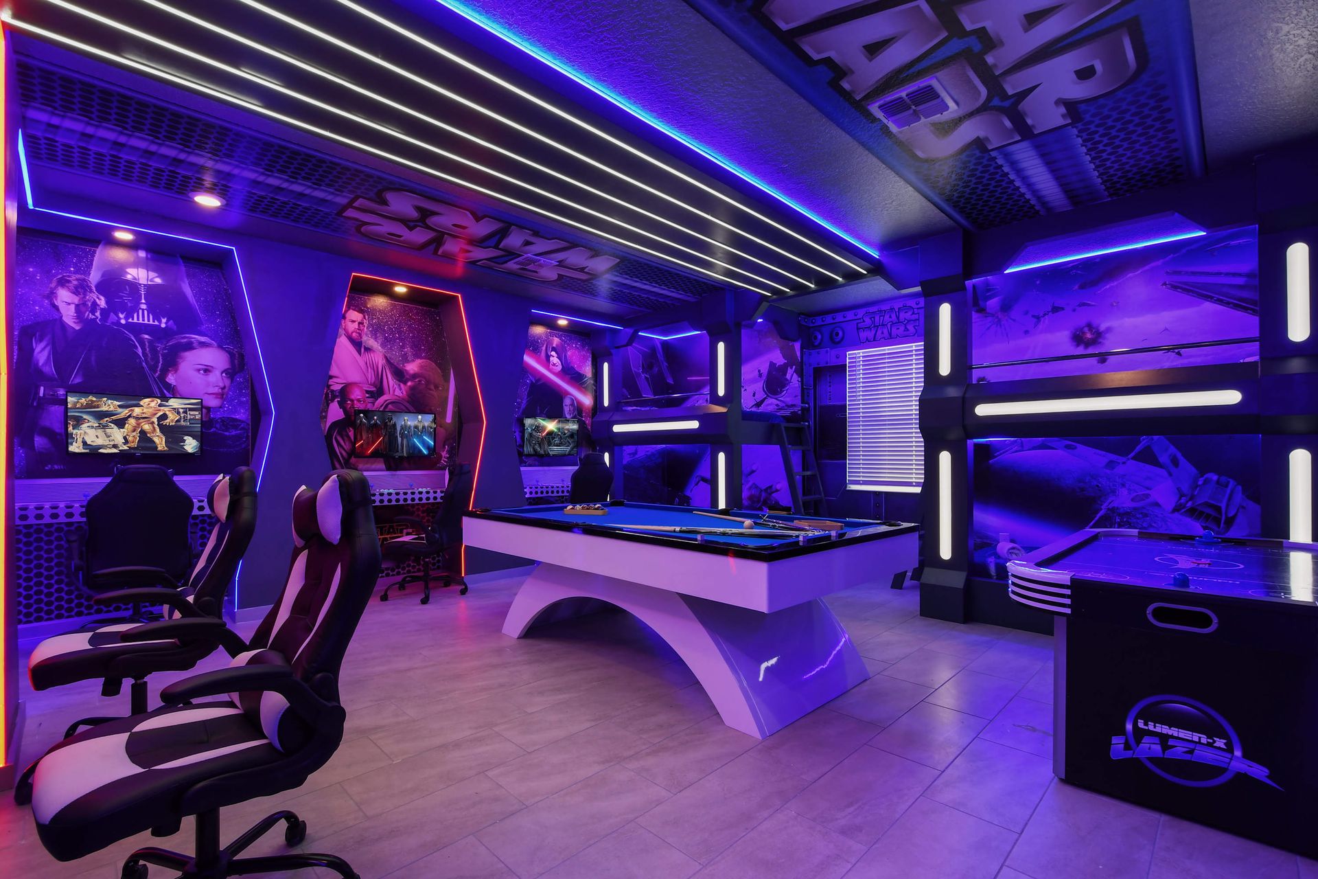 Immersive Star Wars-themed room with custom bunk beds, pool, and air hockey