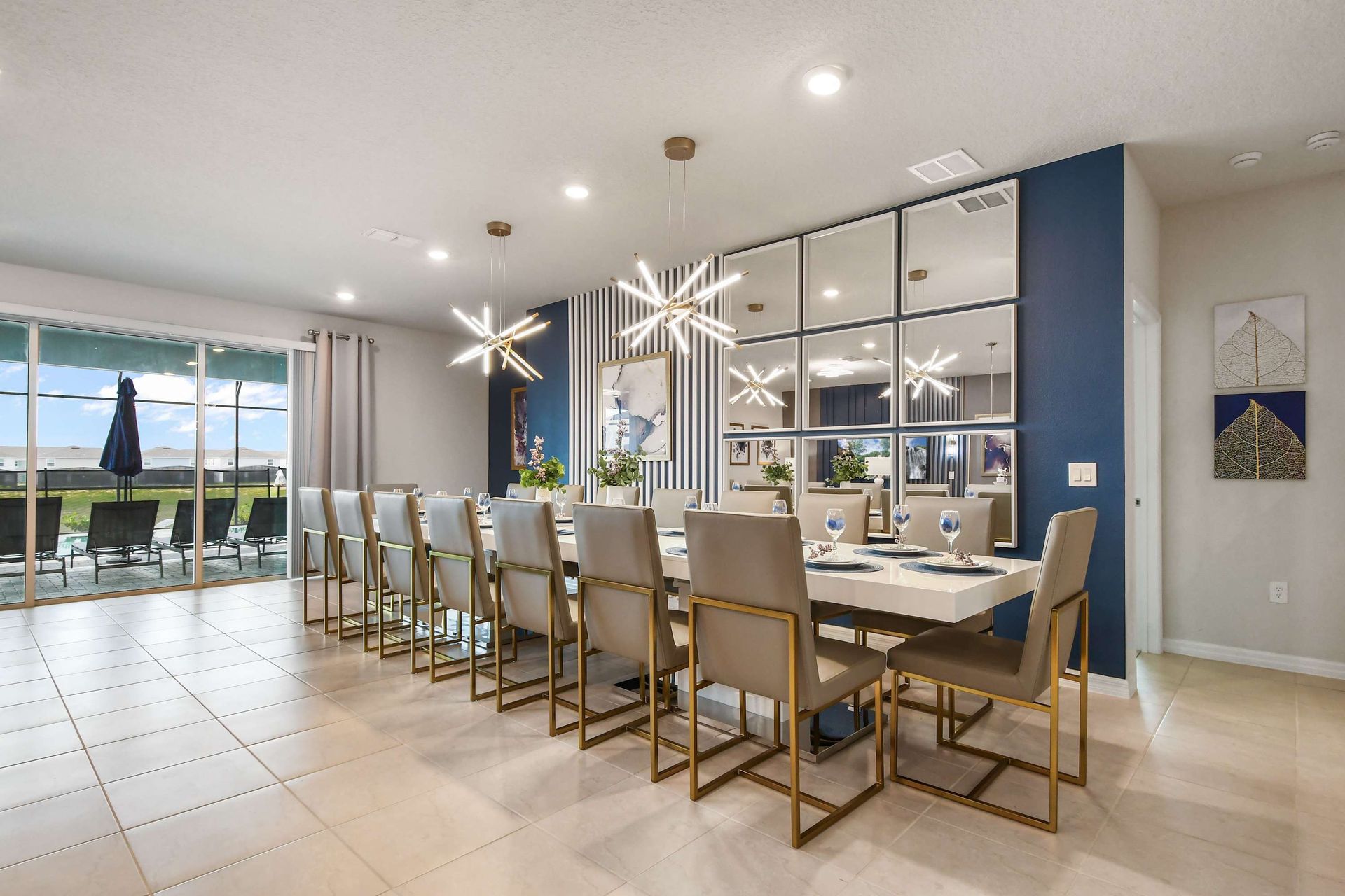Sleek modern dining room with seating for 16 and stylish designer lighting