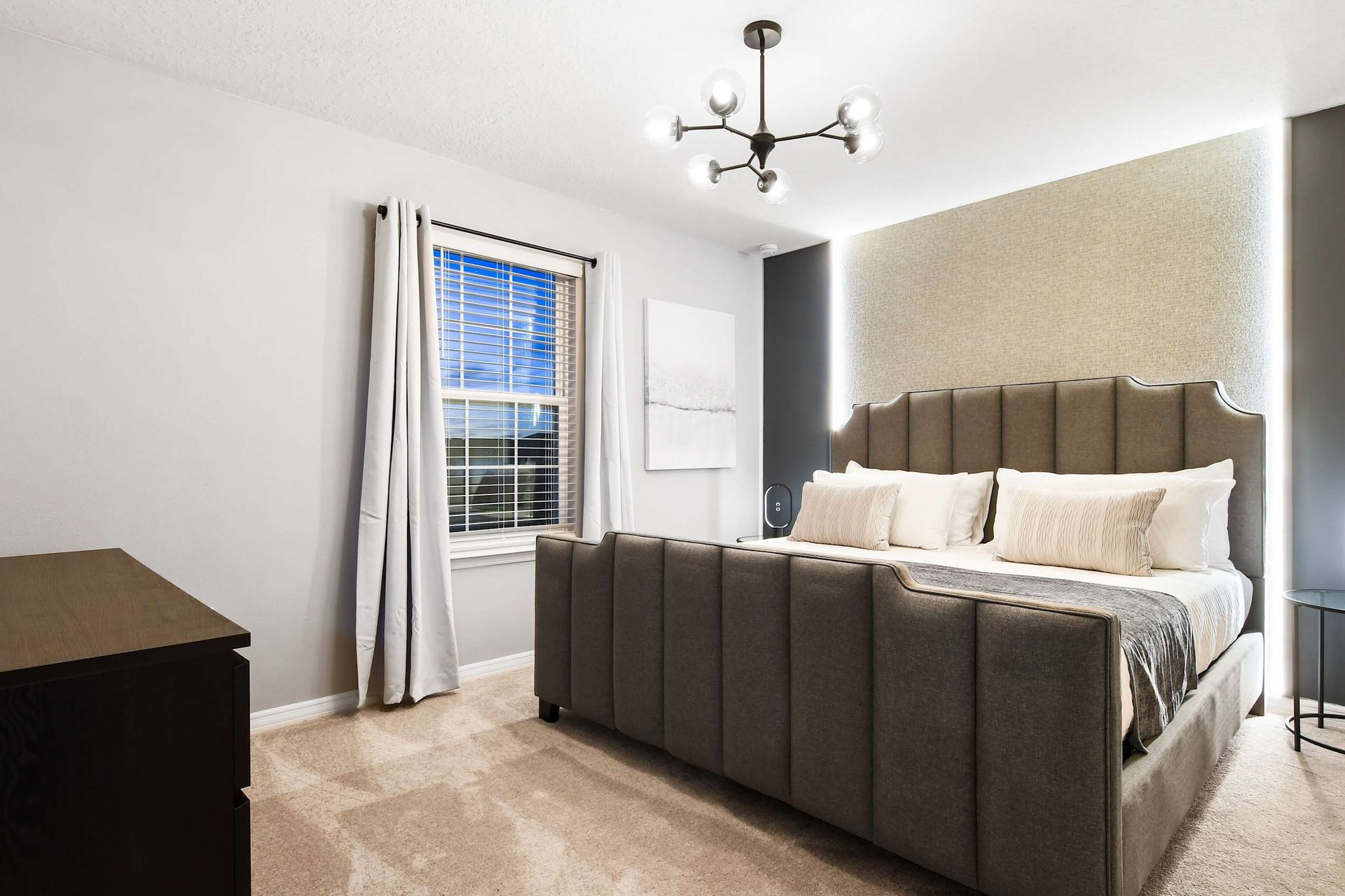 The spacious second bedroom with a comfortable king bed