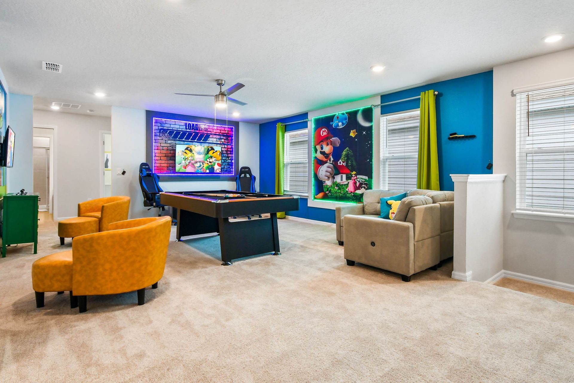 Ultimate Mario-themed game loft with pool table, gaming stations, and cozy seating!
