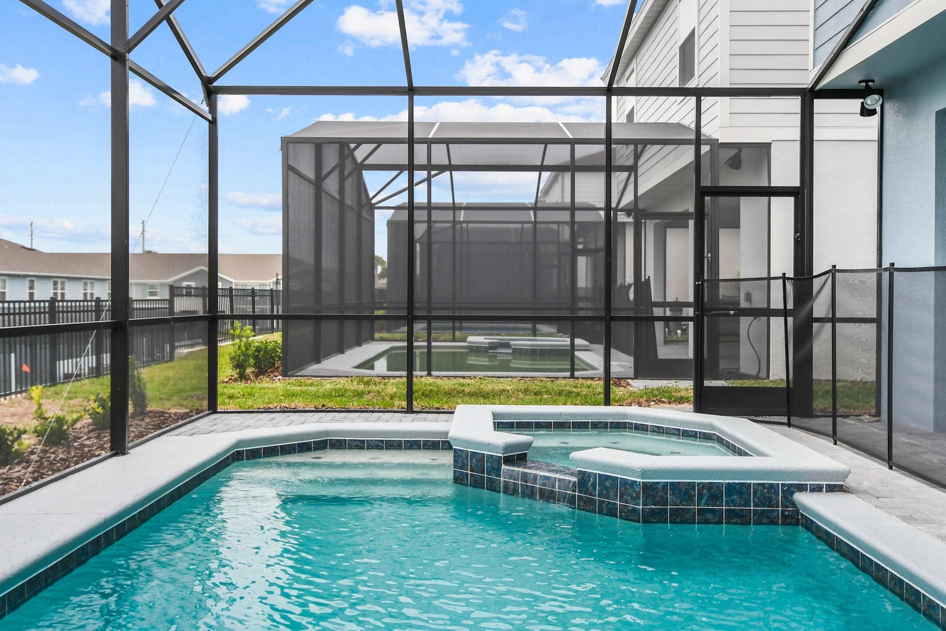 Private screened pool and spa oasis for relaxing swims and sunny Florida days
