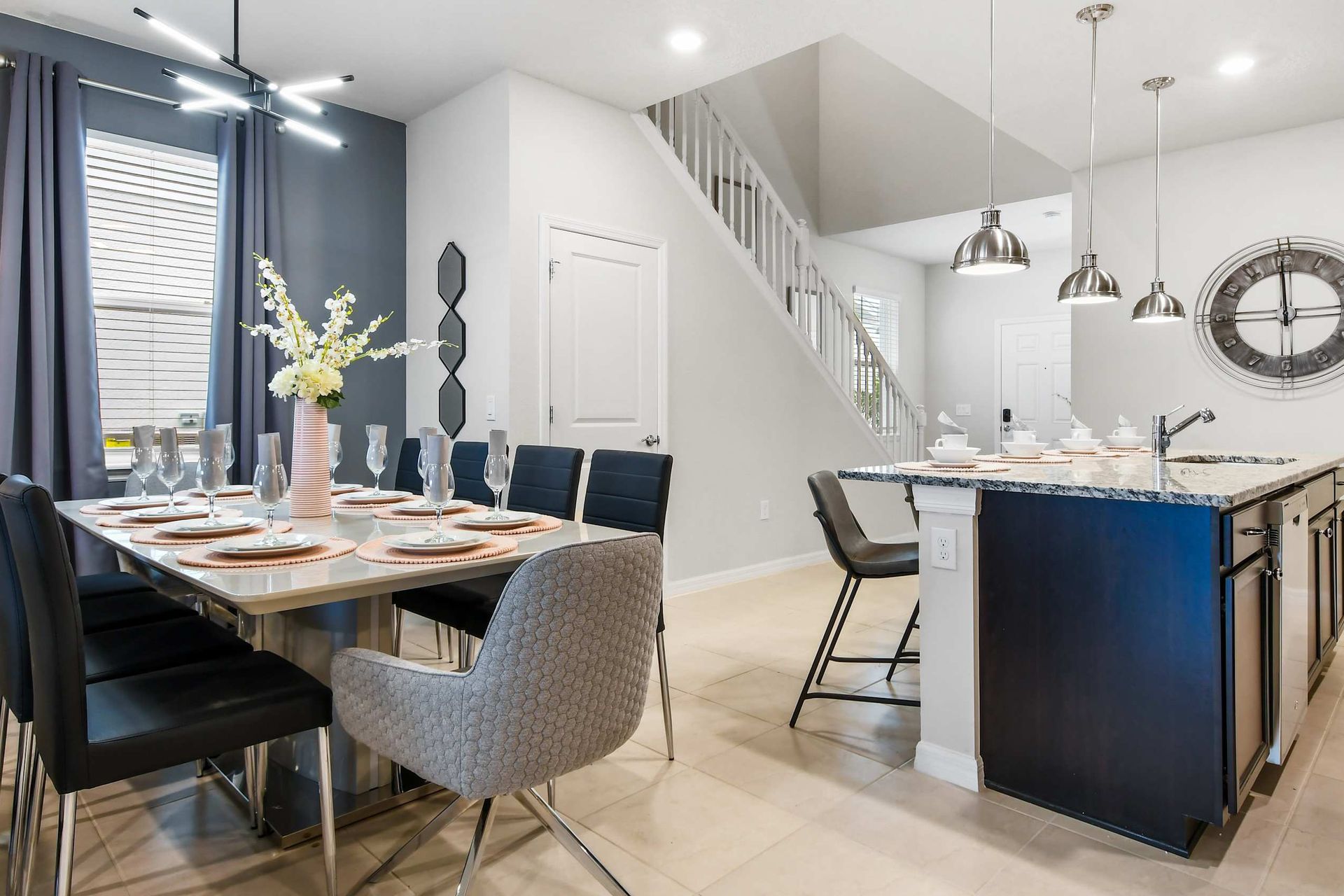 Bright dining space and sleek kitchen island perfect for family meals and gatherings!
