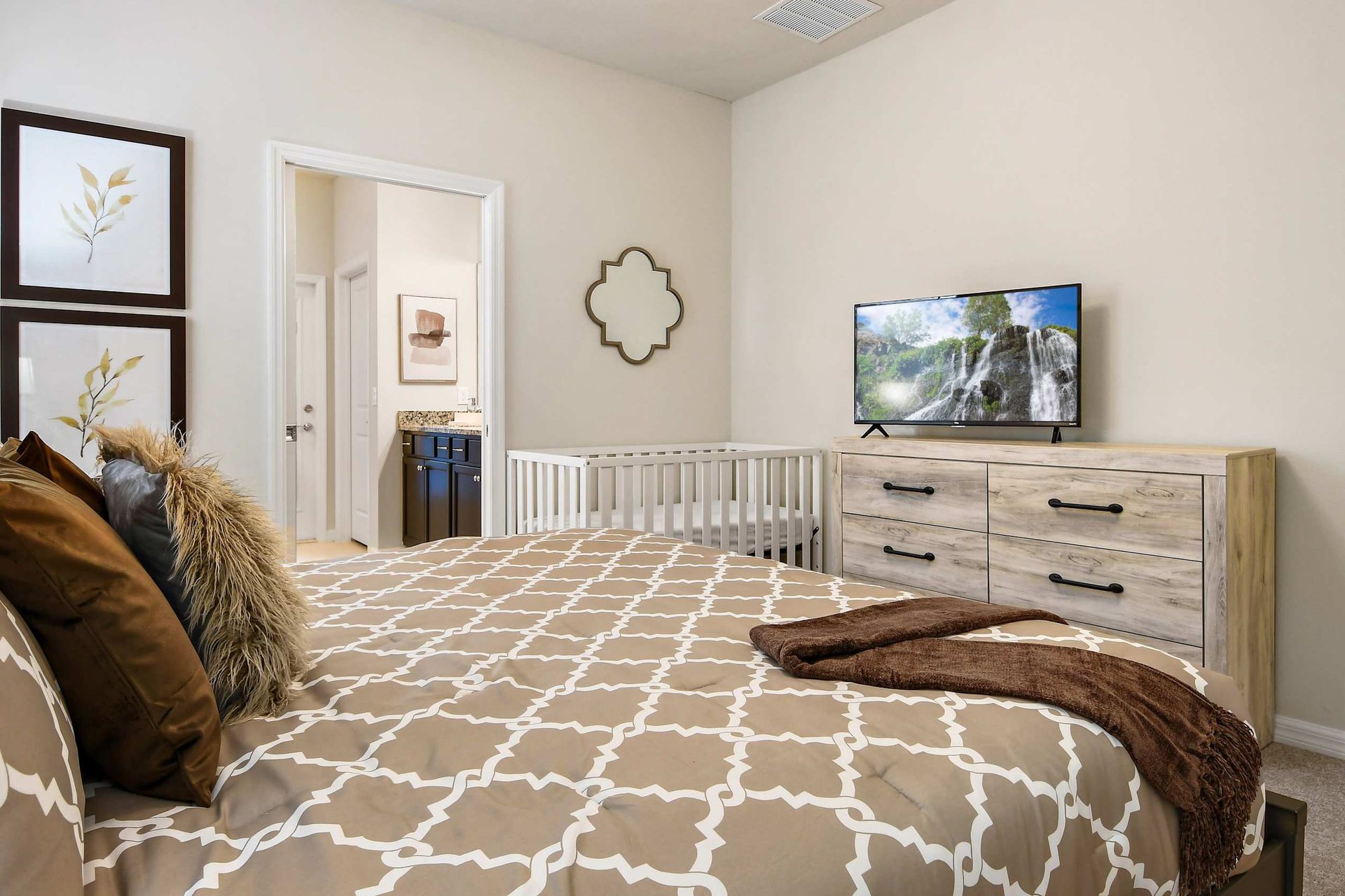 Warm modern bedroom with stylish decor, cozy bedding, and elegant ambient lighting!