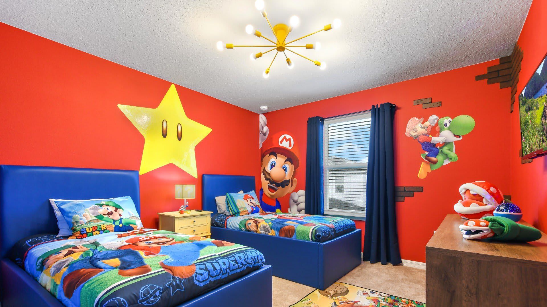Vibrant Super Mario twin room with bold murals, star light, and playful bedding.