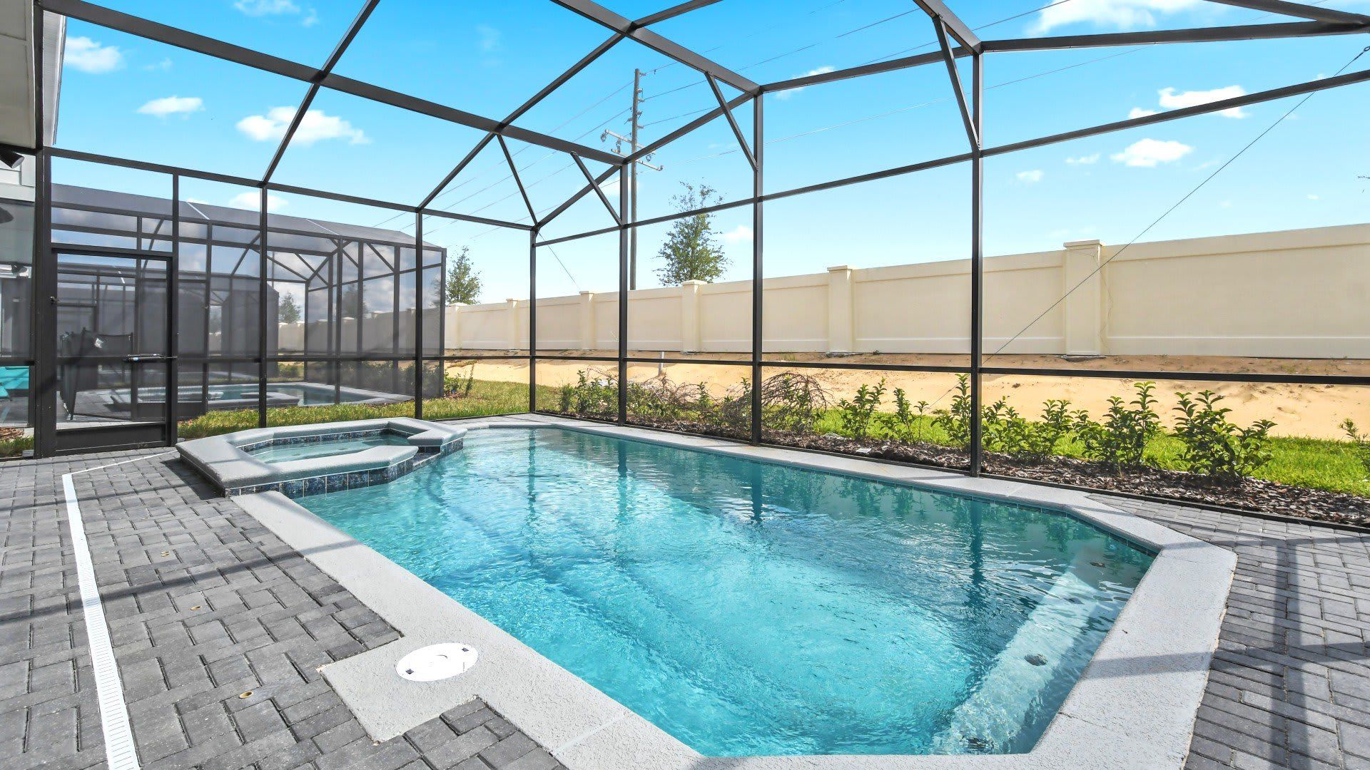 Private screened pool and spa with covered lanai—relax and unwind in style!
