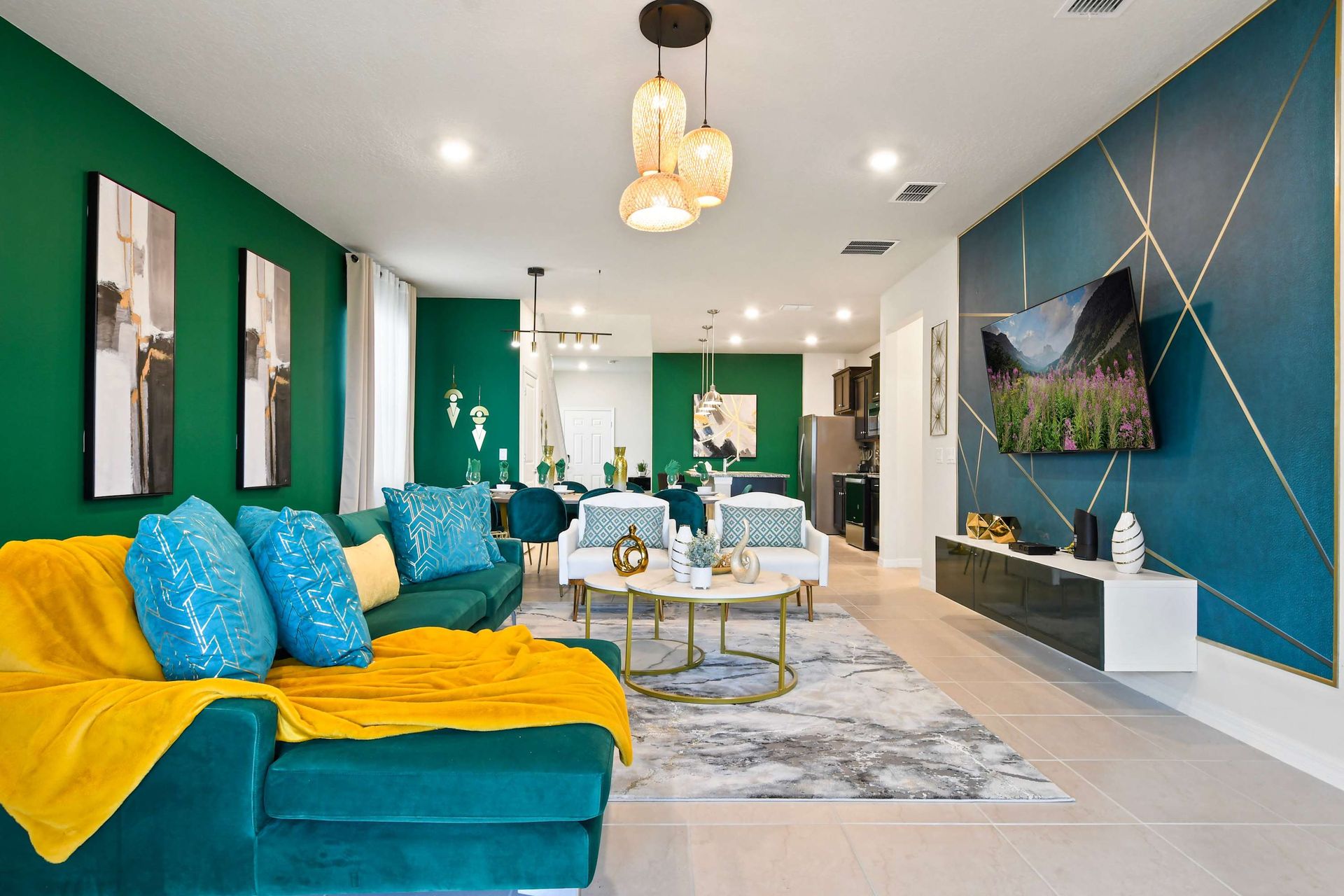 Chic open-concept living with bold colors, luxe textures, and modern design touches.