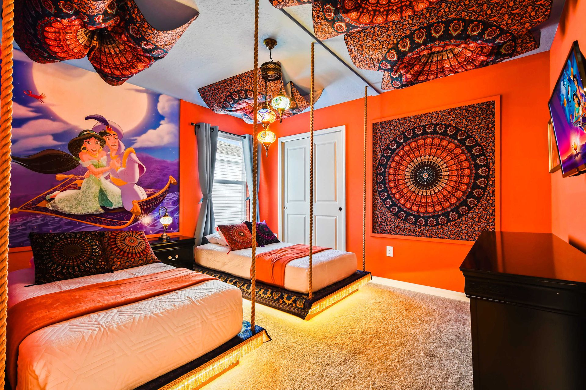 Kids will have fun in this Aladdin bedroom with beautiful lights