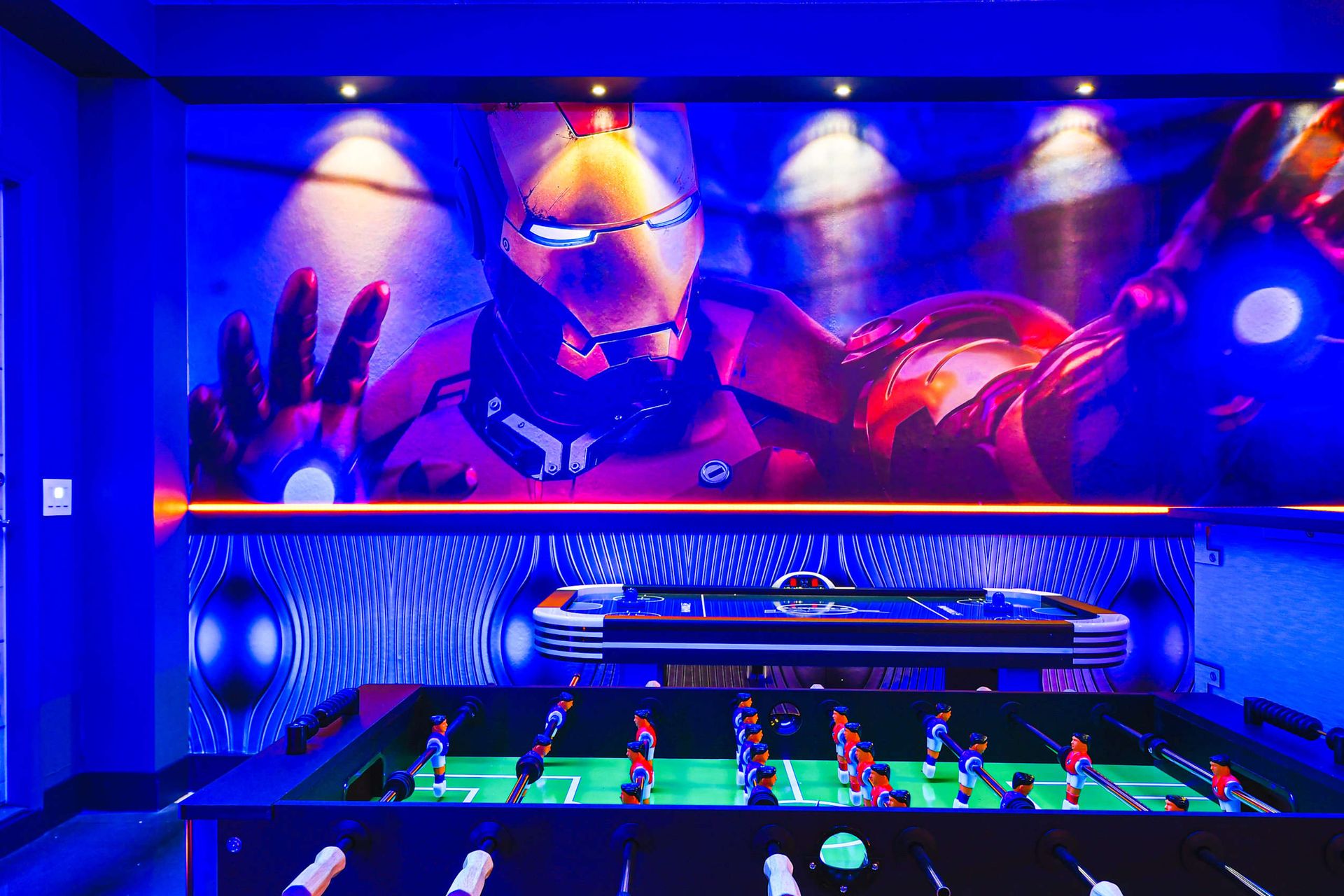 The game room is stylishly furnished with Avenger theme with cool lights