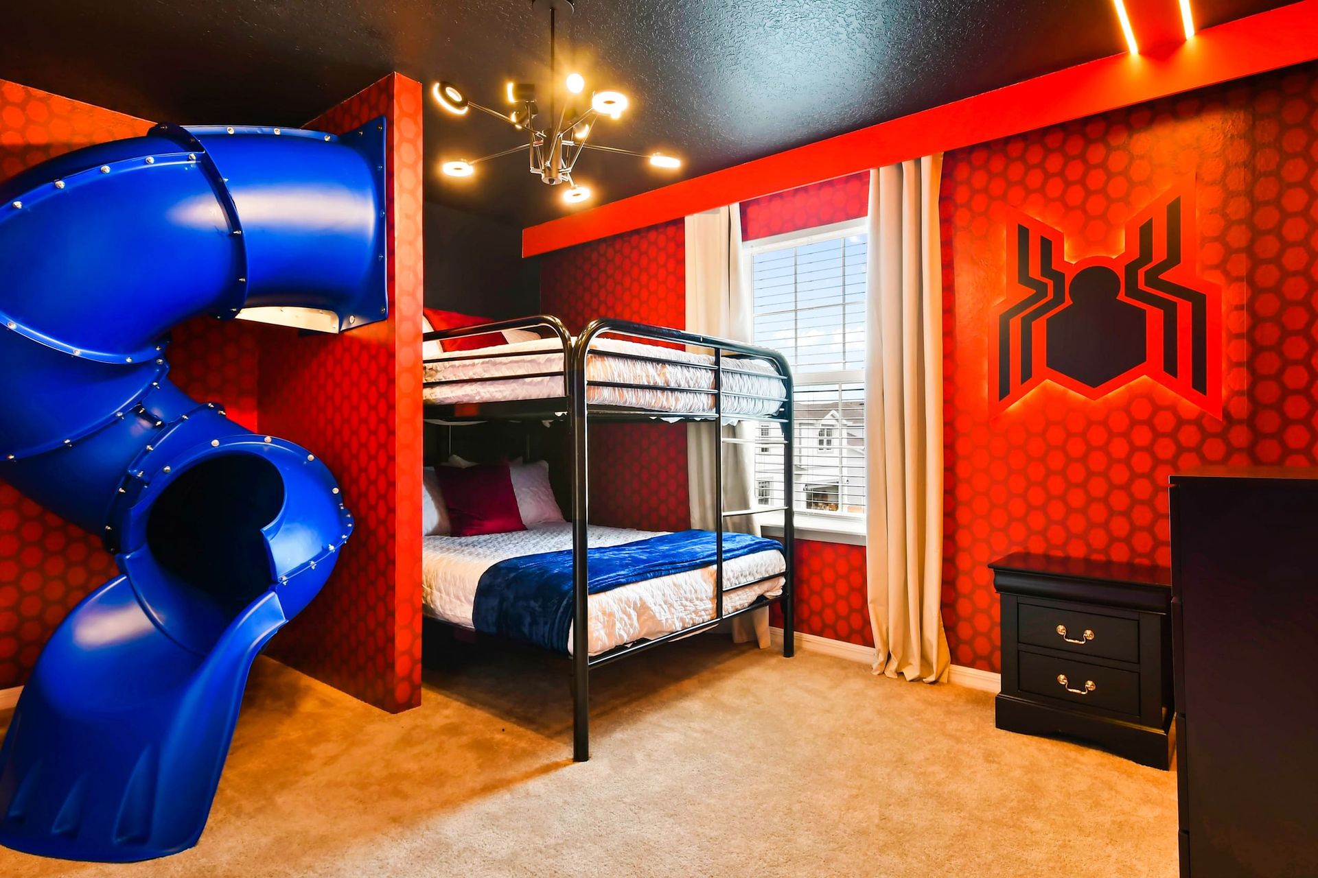 Kids will love the upstairs bedroom with a cool Spider-man theme