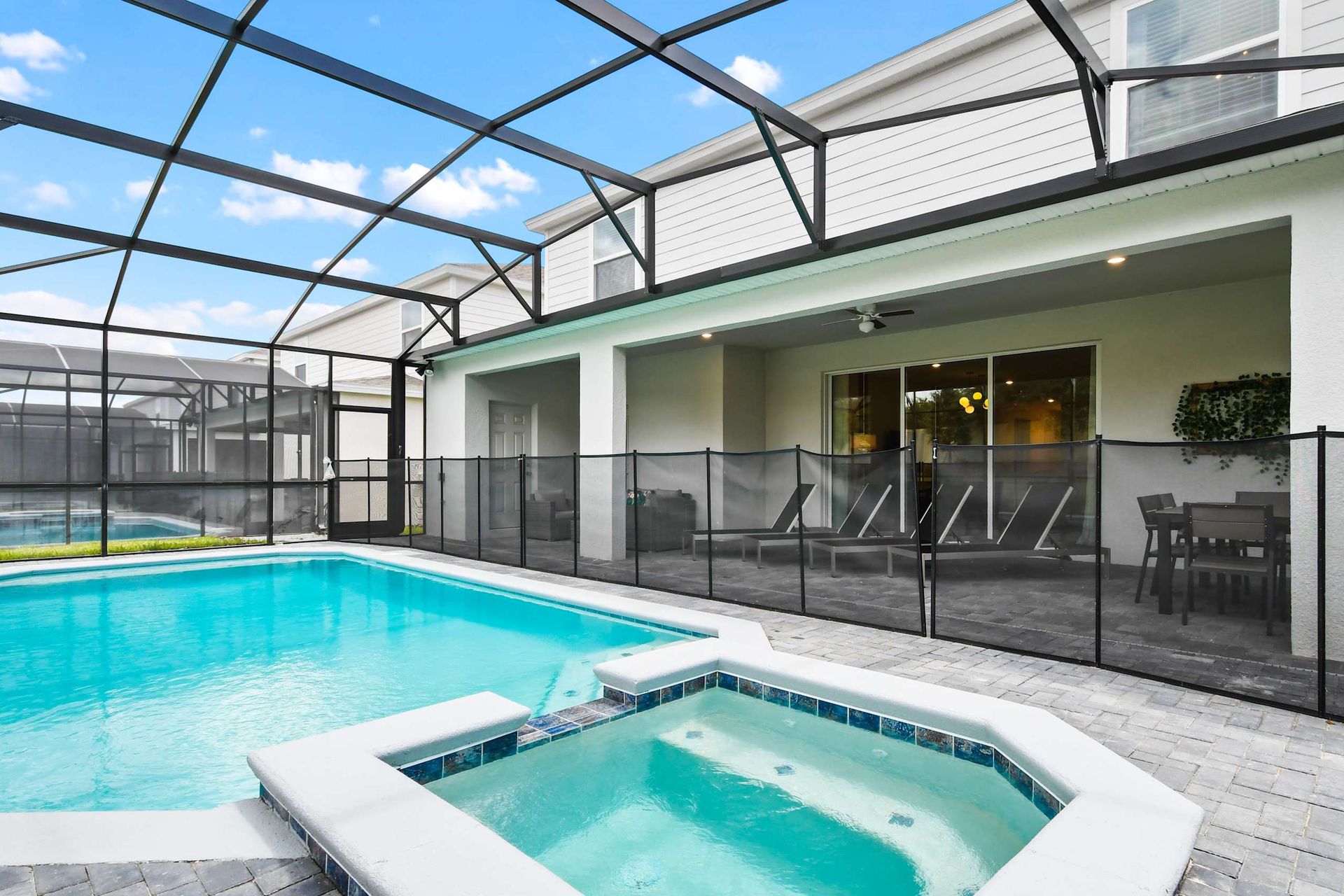 Relax in a private screened pool and spa with sunny views and peaceful vibes

