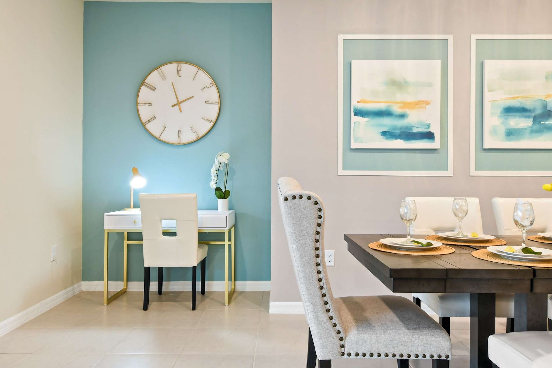 Stylish dining and workspace combo with modern decor and serene color tones.