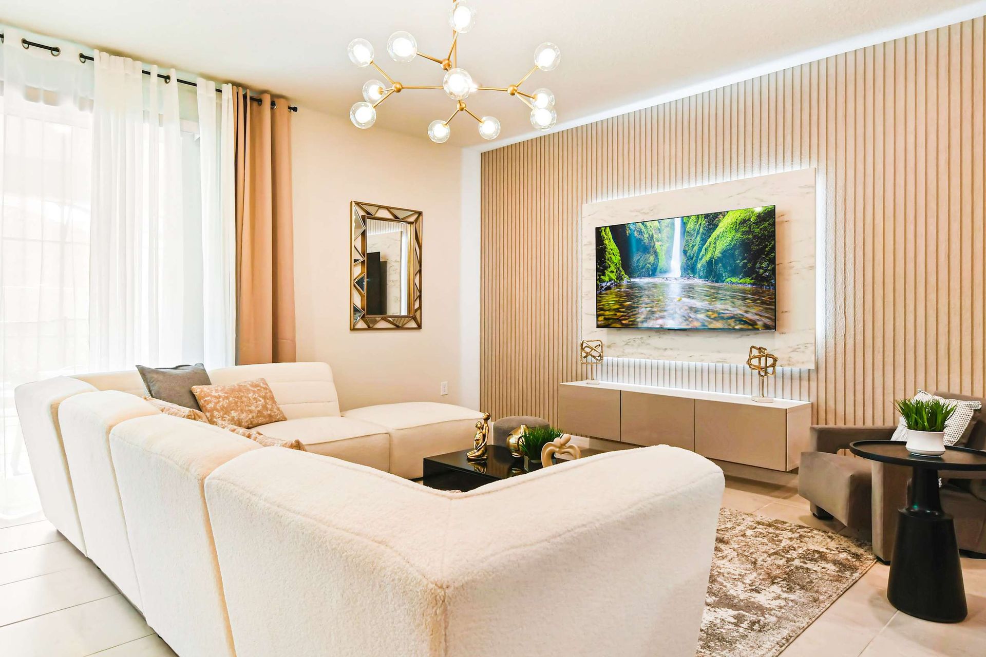 Spacious living room area with cozy sofa, perfect for family reunion