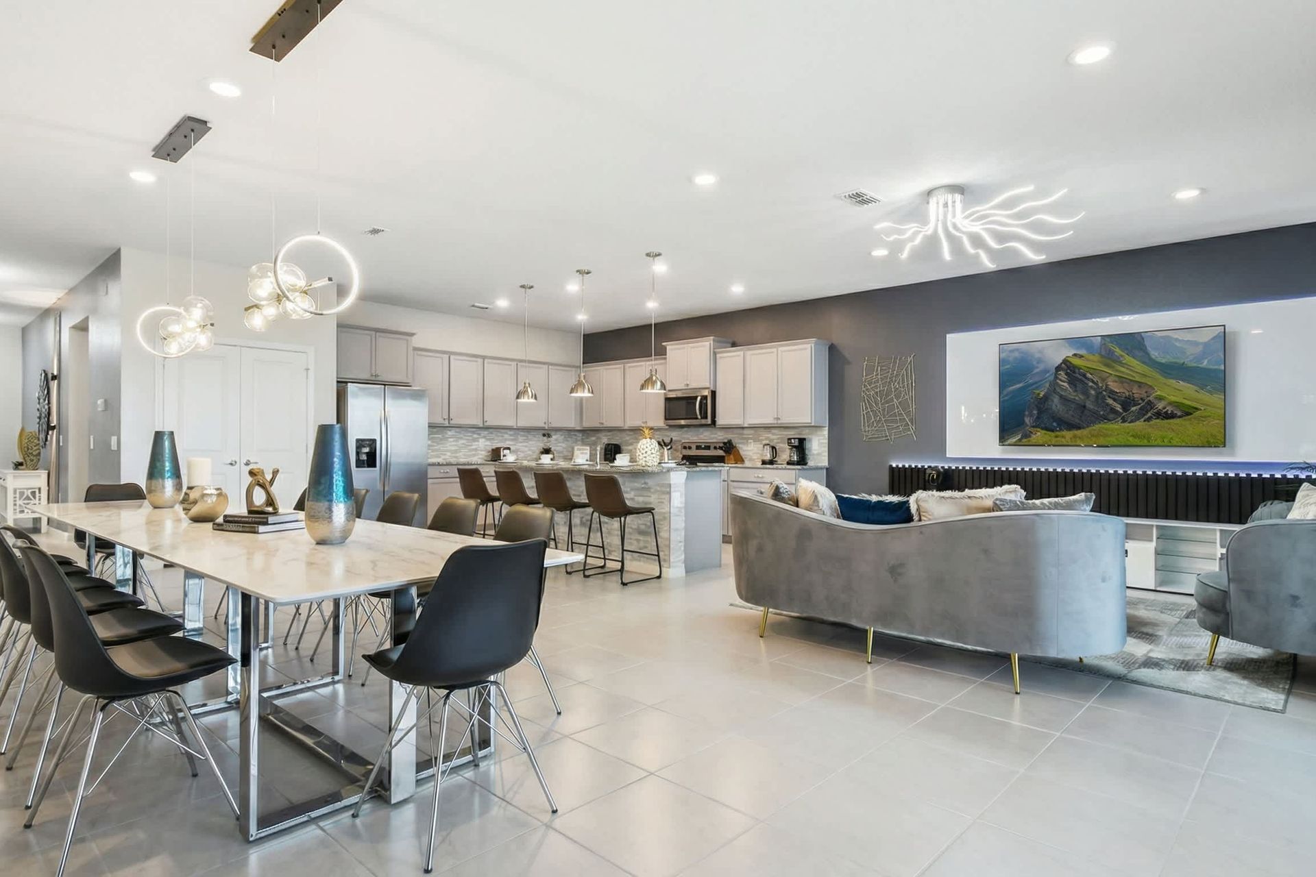 Sleek open layout with gourmet kitchen, designer dining, and luxe living area.