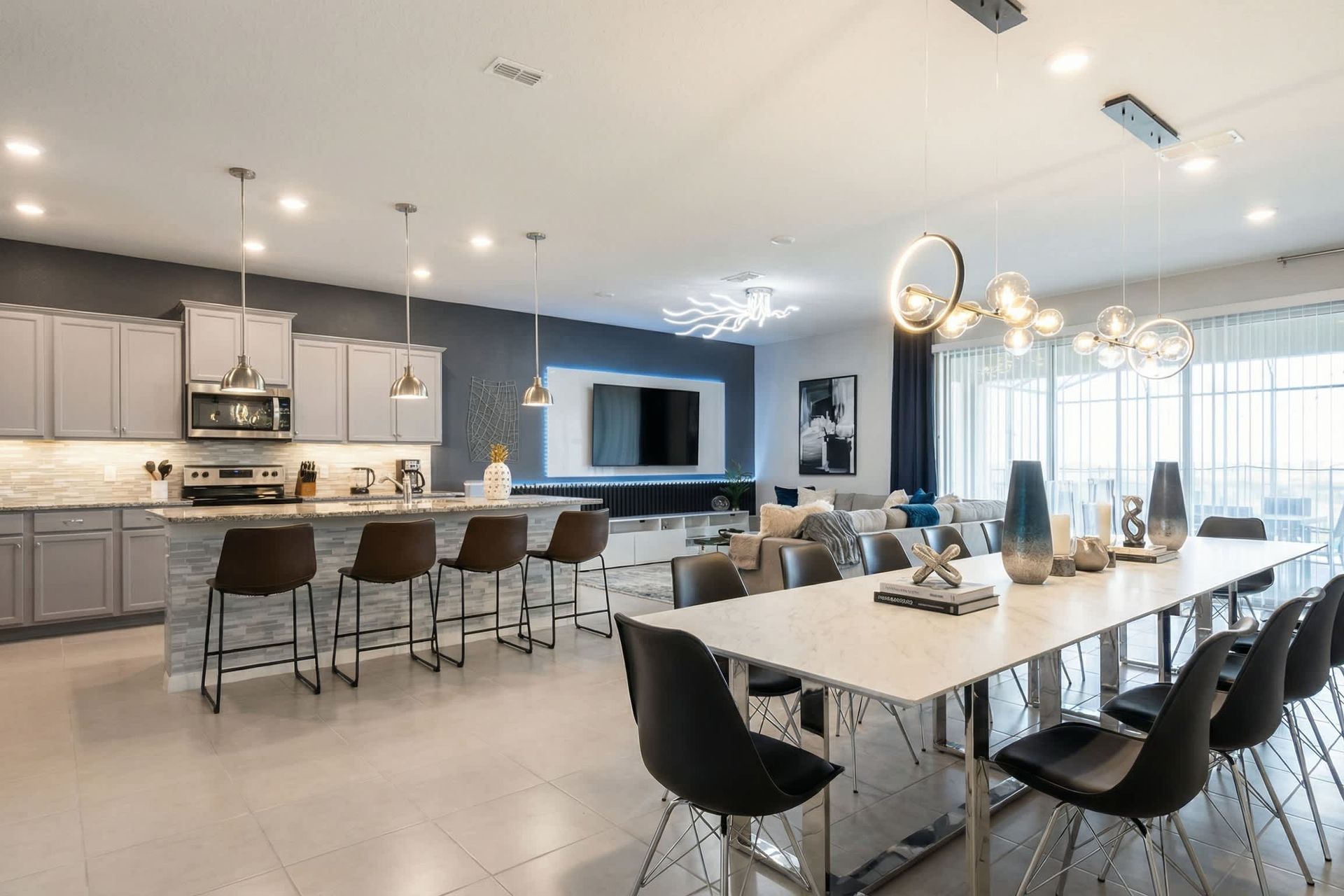 Stunning open-concept kitchen, dining, and living with upscale modern finishes.