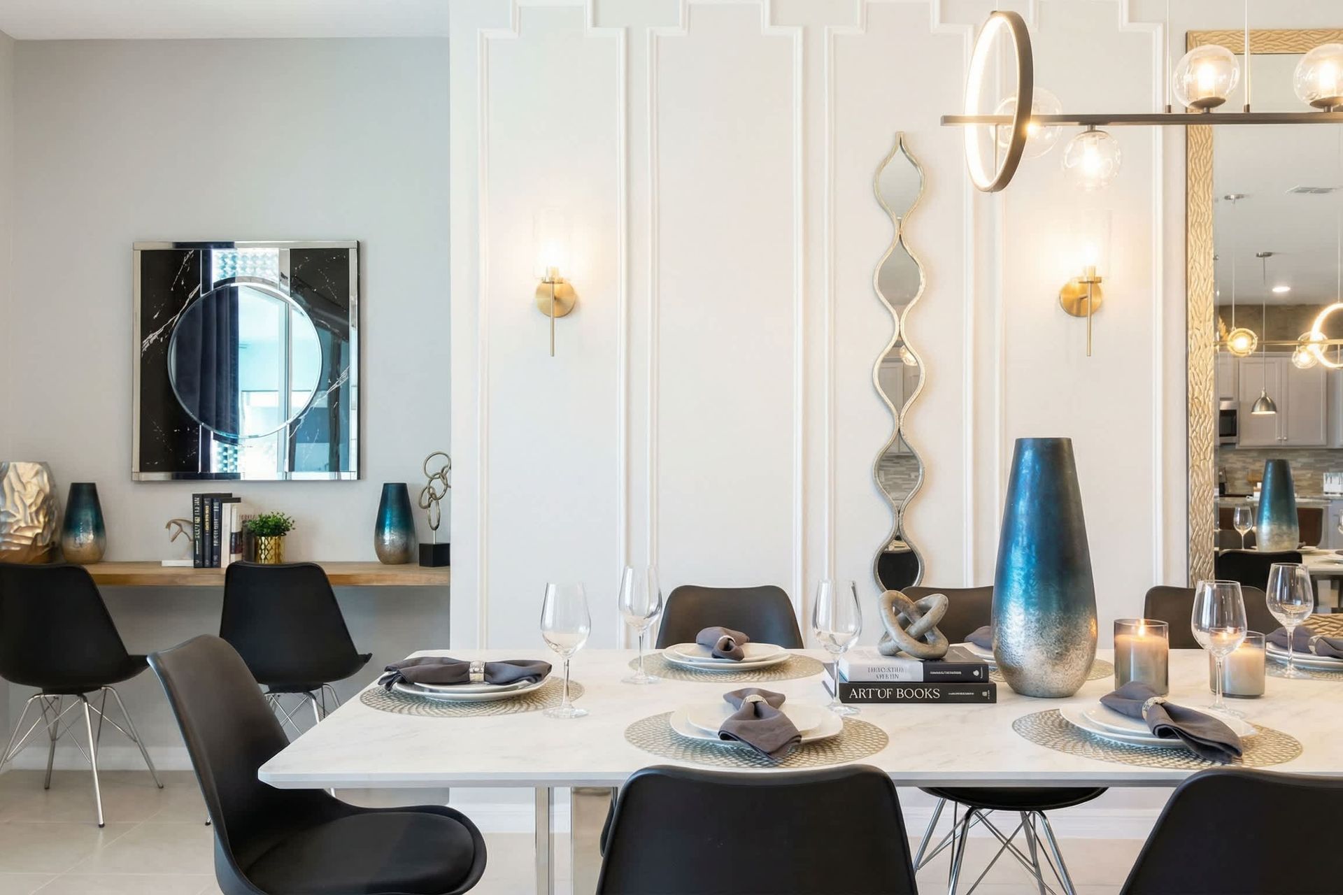 Chic dining space with a stylish two-person workspace and modern artistic flair.