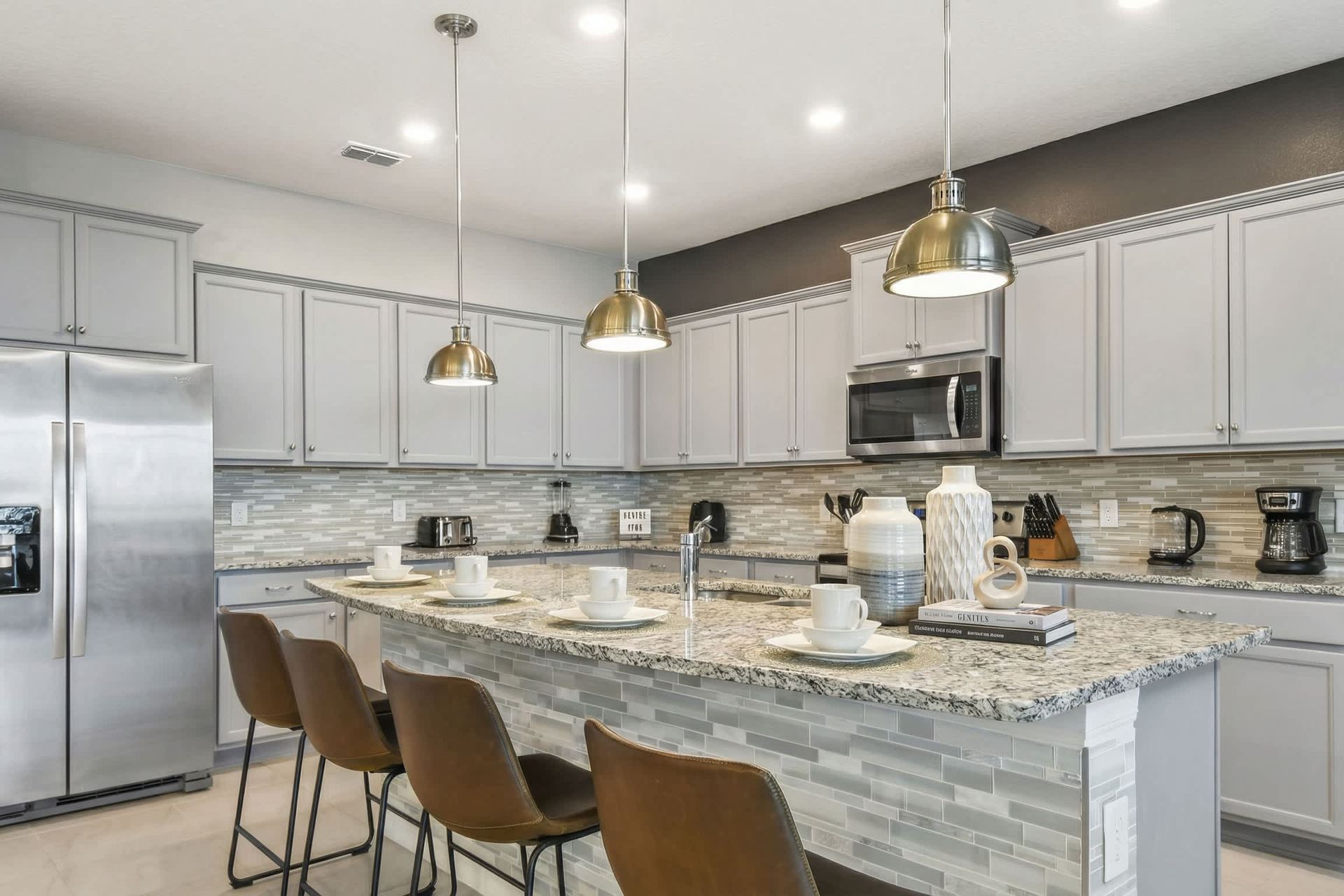 Modern kitchen with stylish seating, perfect for your next culinary adventure.