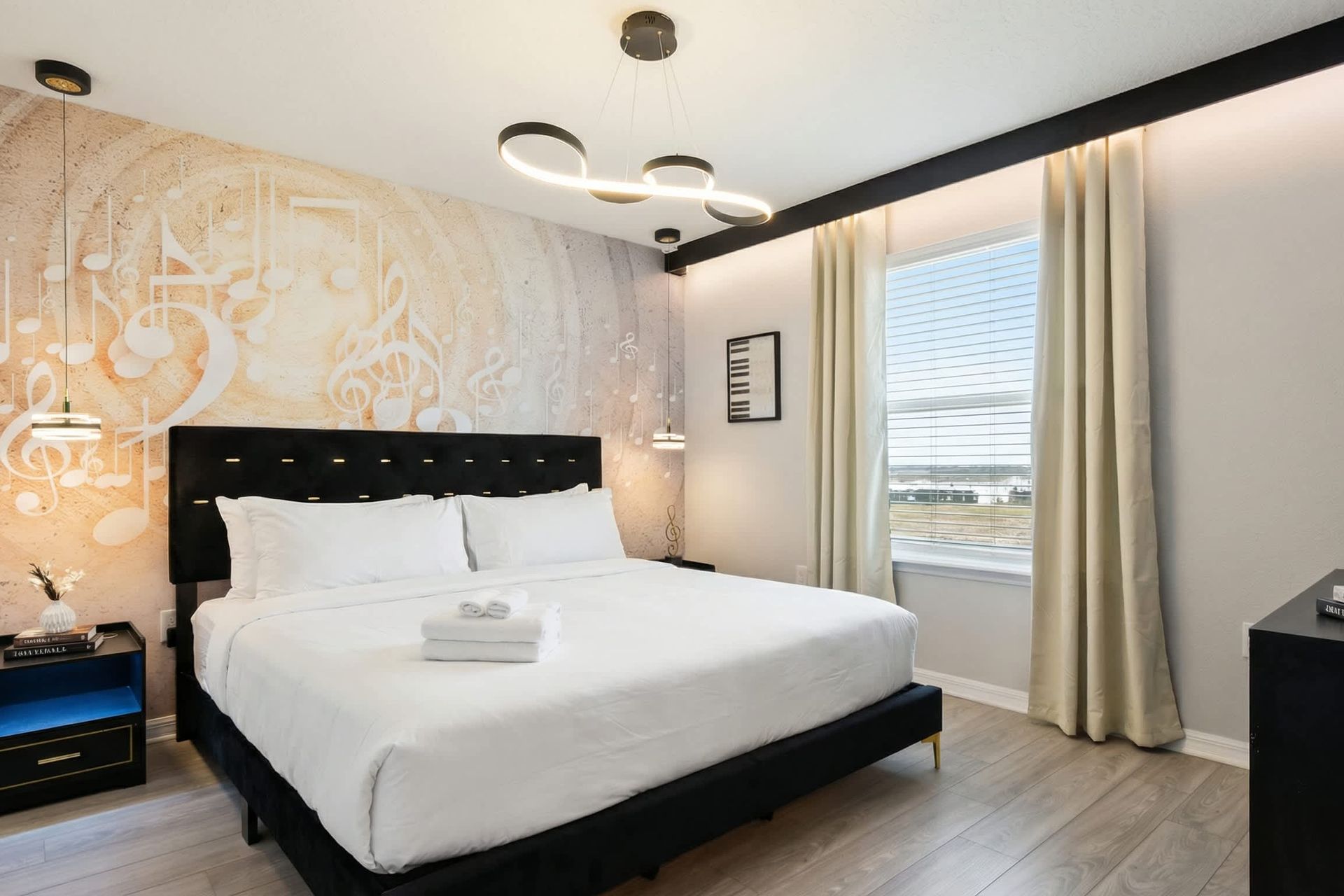 Chic music-inspired suite with gold accents, note-themed decor, and modern flair.