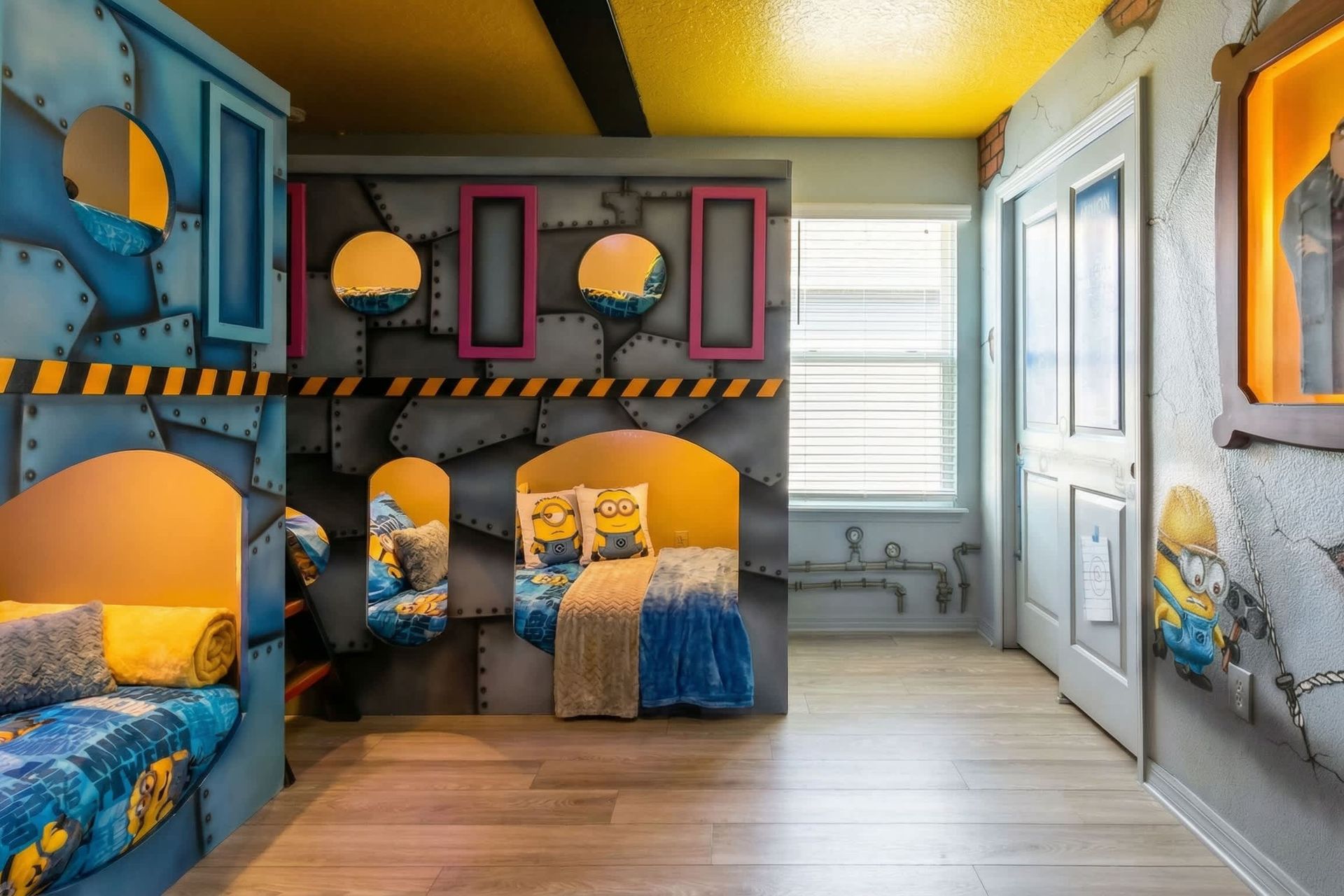 Minion-themed bunk room with playful decor and immersive villain lair vibes!