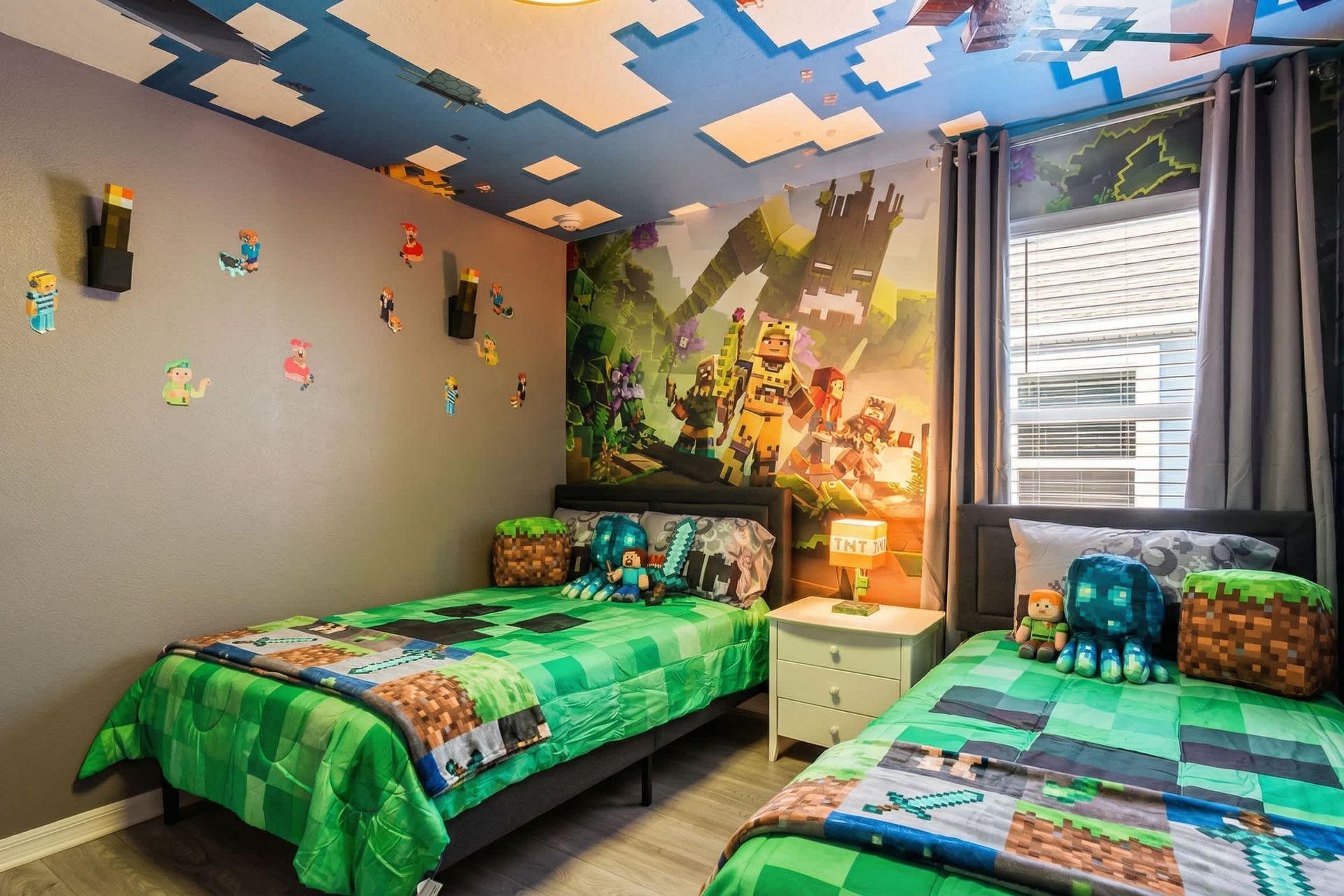 Immersive Minecraft room with pixel-art walls, themed beds, and ceiling decor.
