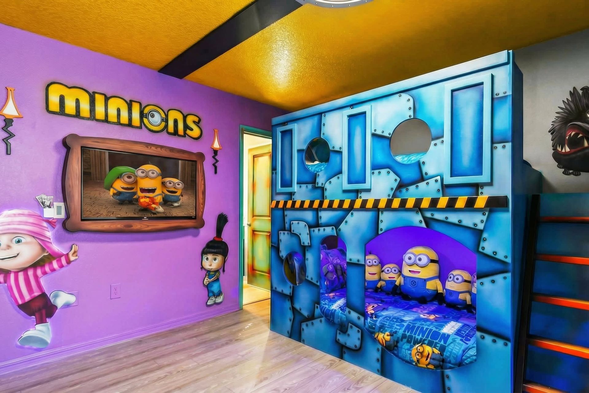 Minions-themed bunk room bursting with color, character fun, and cool glowing beds.