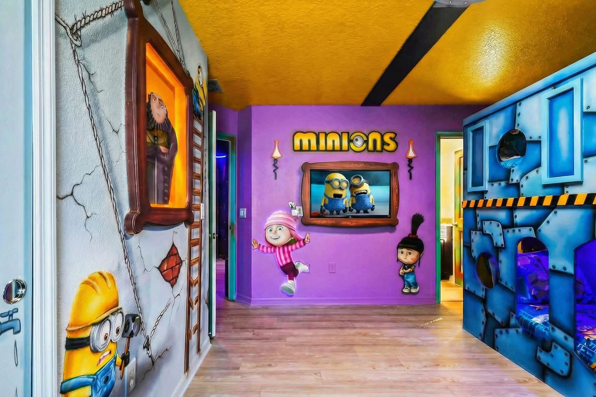 Whimsical Minions room packed with themed bunk beds, colorful art, and fun surprises.