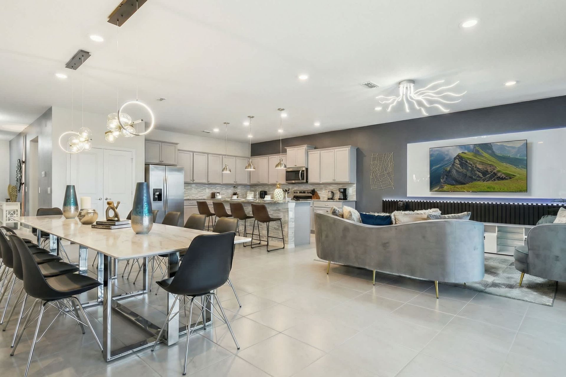 Sleek open layout with gourmet kitchen, designer dining, and luxe living area.