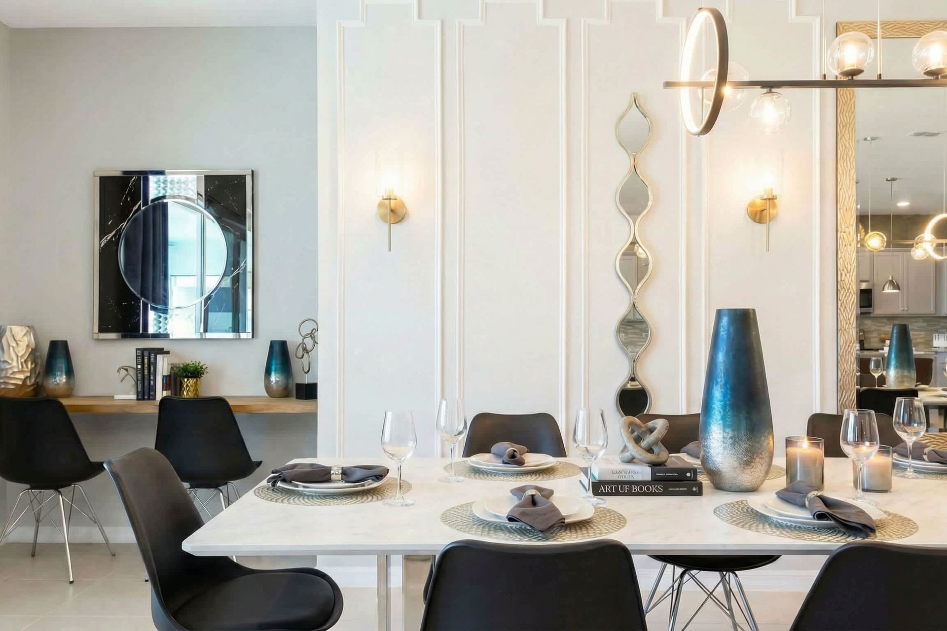 Chic dining space with a stylish two-person workspace and modern artistic flair.
