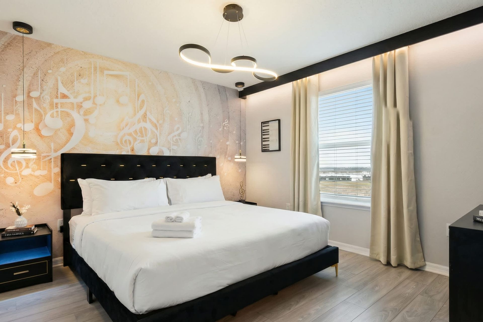 Chic music-inspired suite with gold accents, note-themed decor, and modern flair.