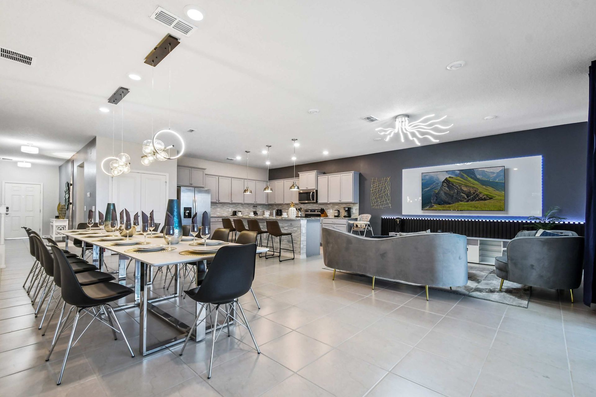 Sleek open layout with gourmet kitchen, designer dining, and luxe living area.