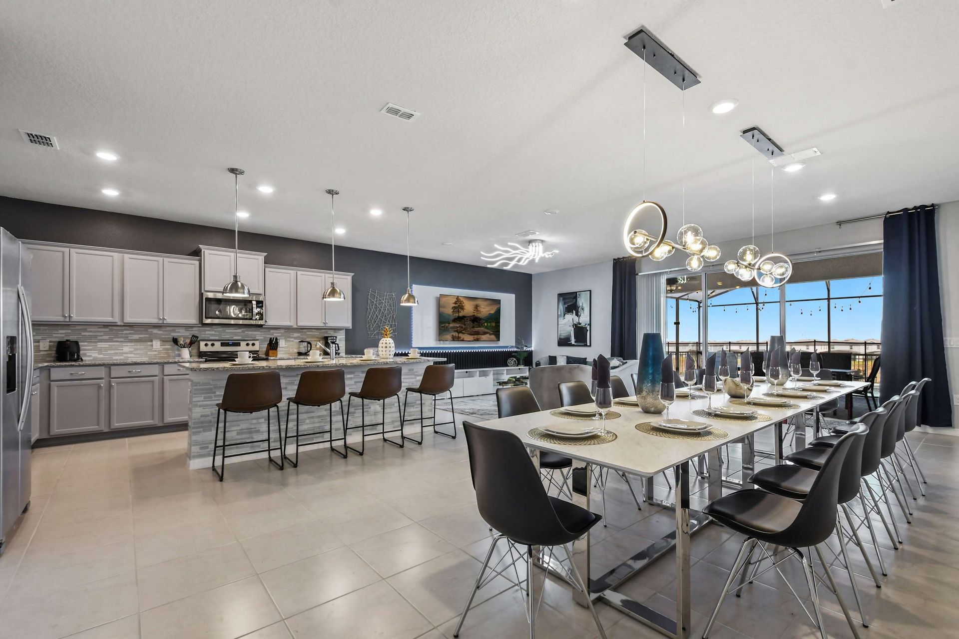 Stunning open-concept kitchen, dining, and living with upscale modern finishes.