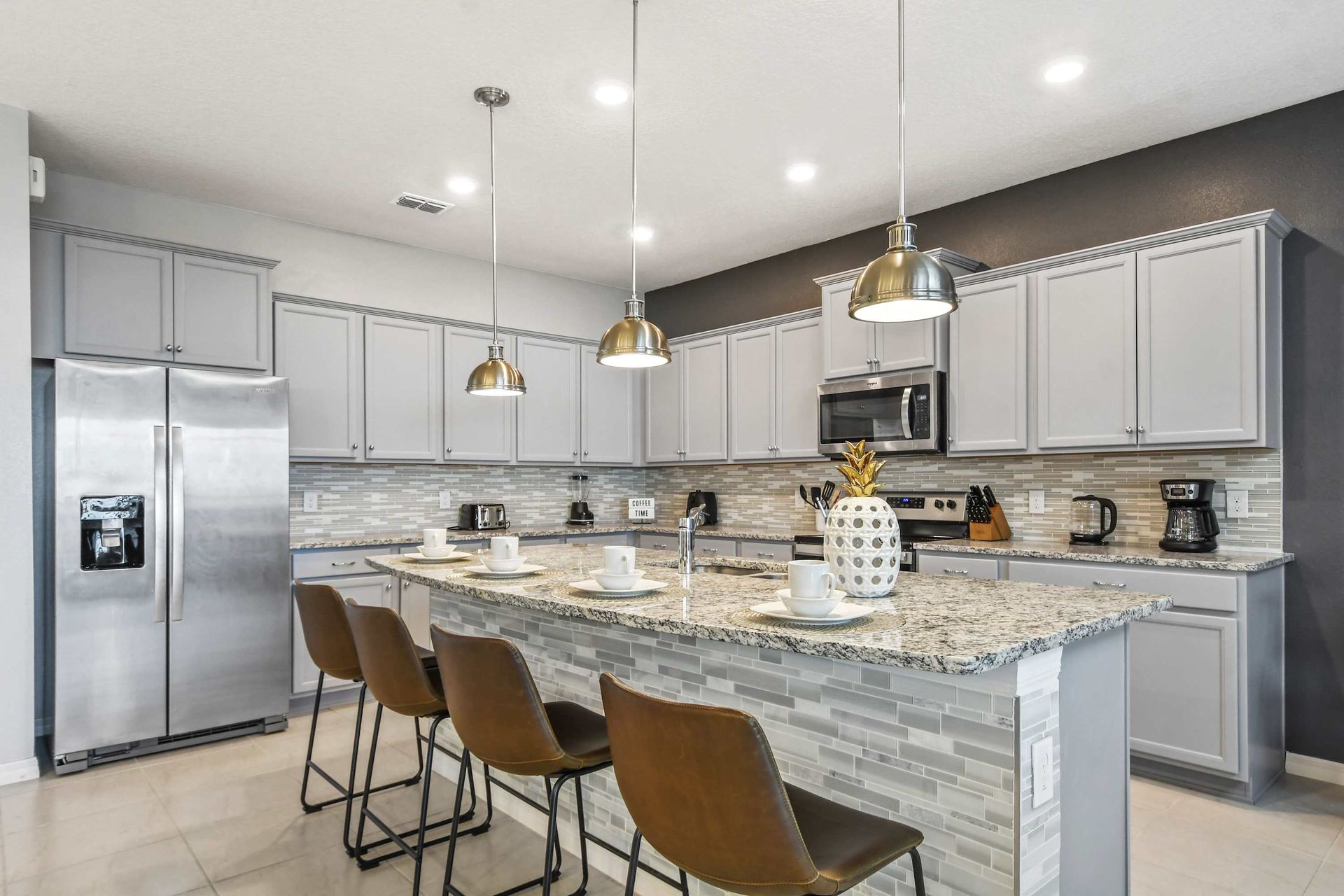 Modern kitchen with stylish seating, perfect for your next culinary adventure.