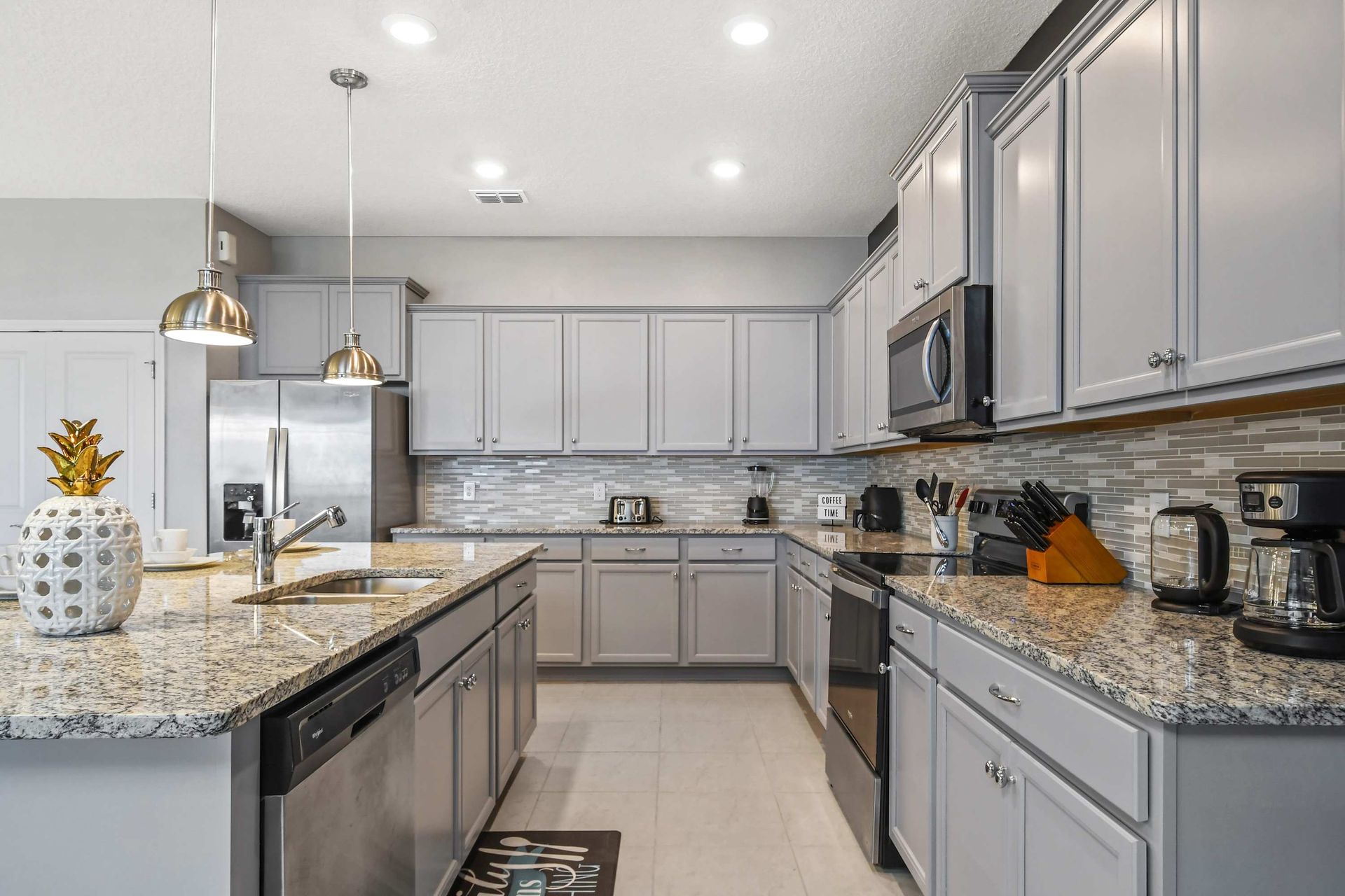 Bright, fully-equipped kitchen with modern appliances and inviting ambiance.