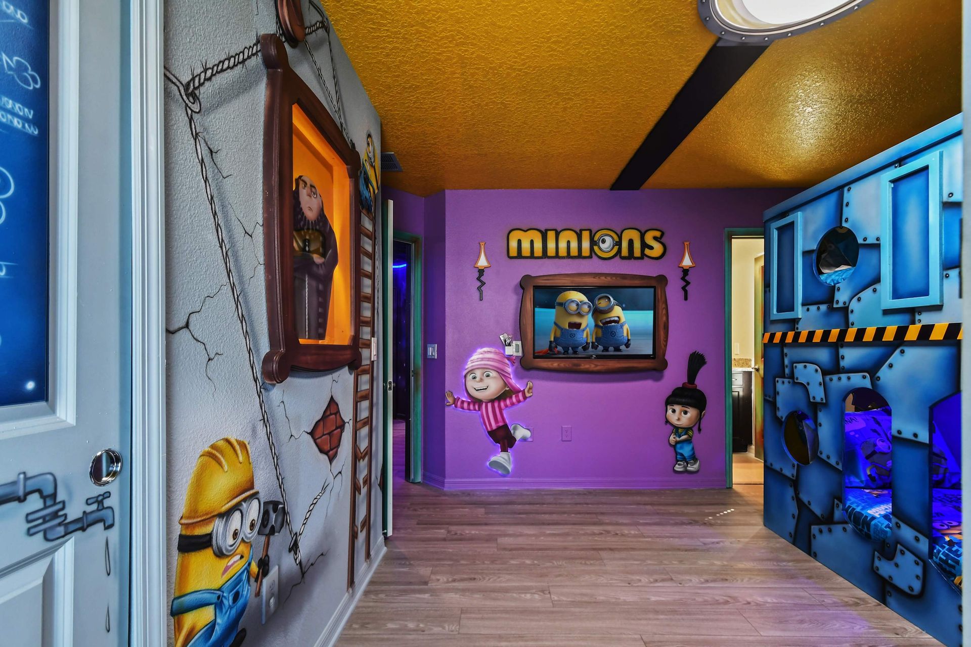 Whimsical Minions room packed with themed bunk beds, colorful art, and fun surprises.