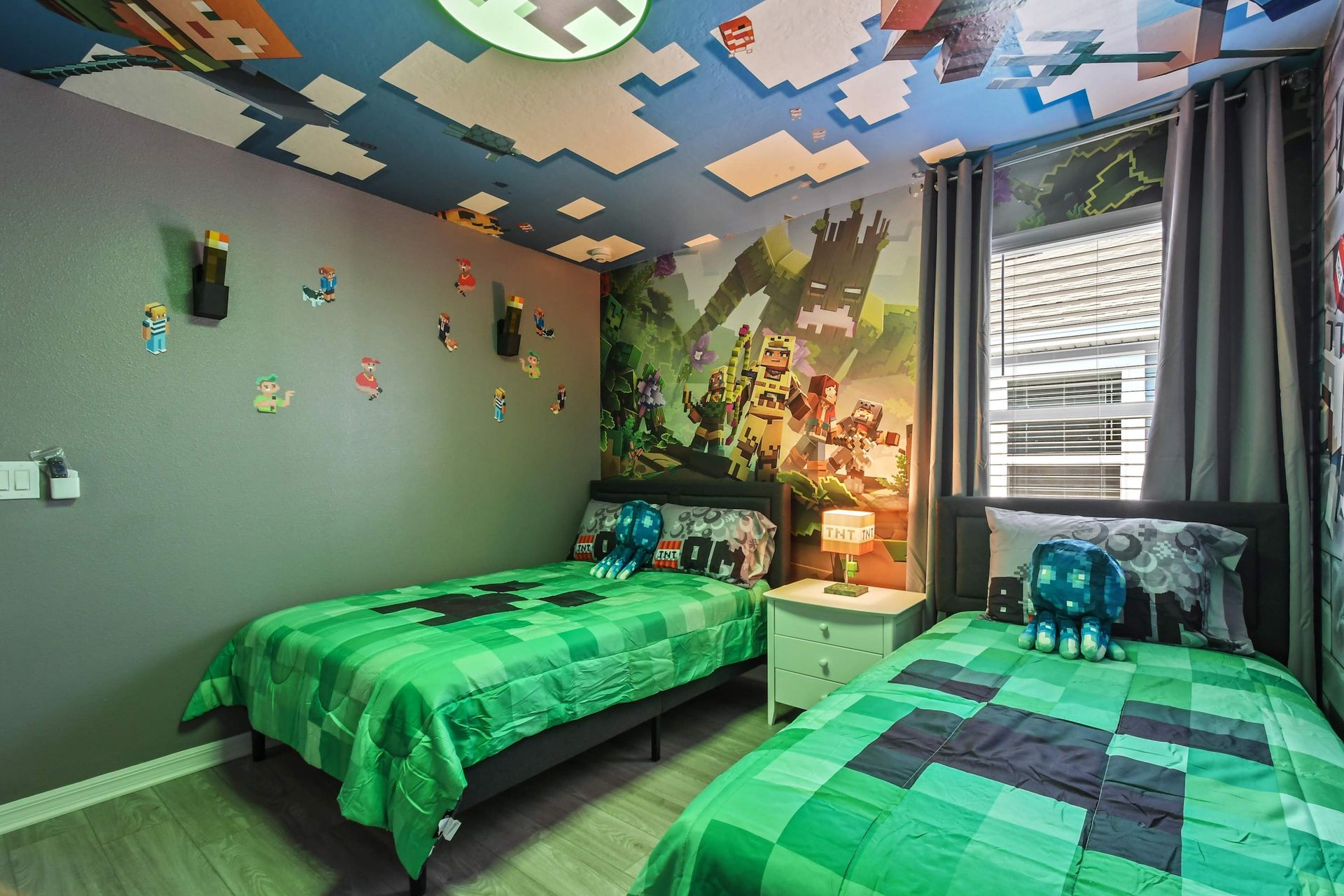 Immersive Minecraft room with pixel-art walls, themed beds, and ceiling decor.