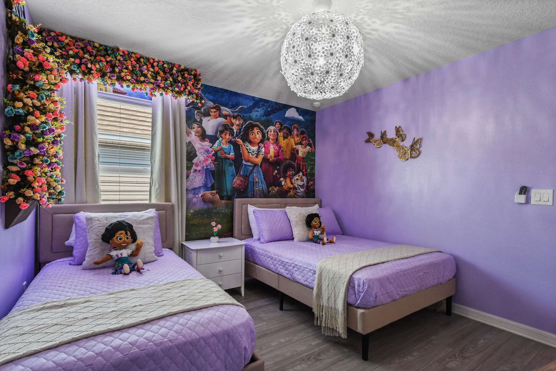 Enchanting lavender room with floral decor, butterfly accents, and magical wall art.
