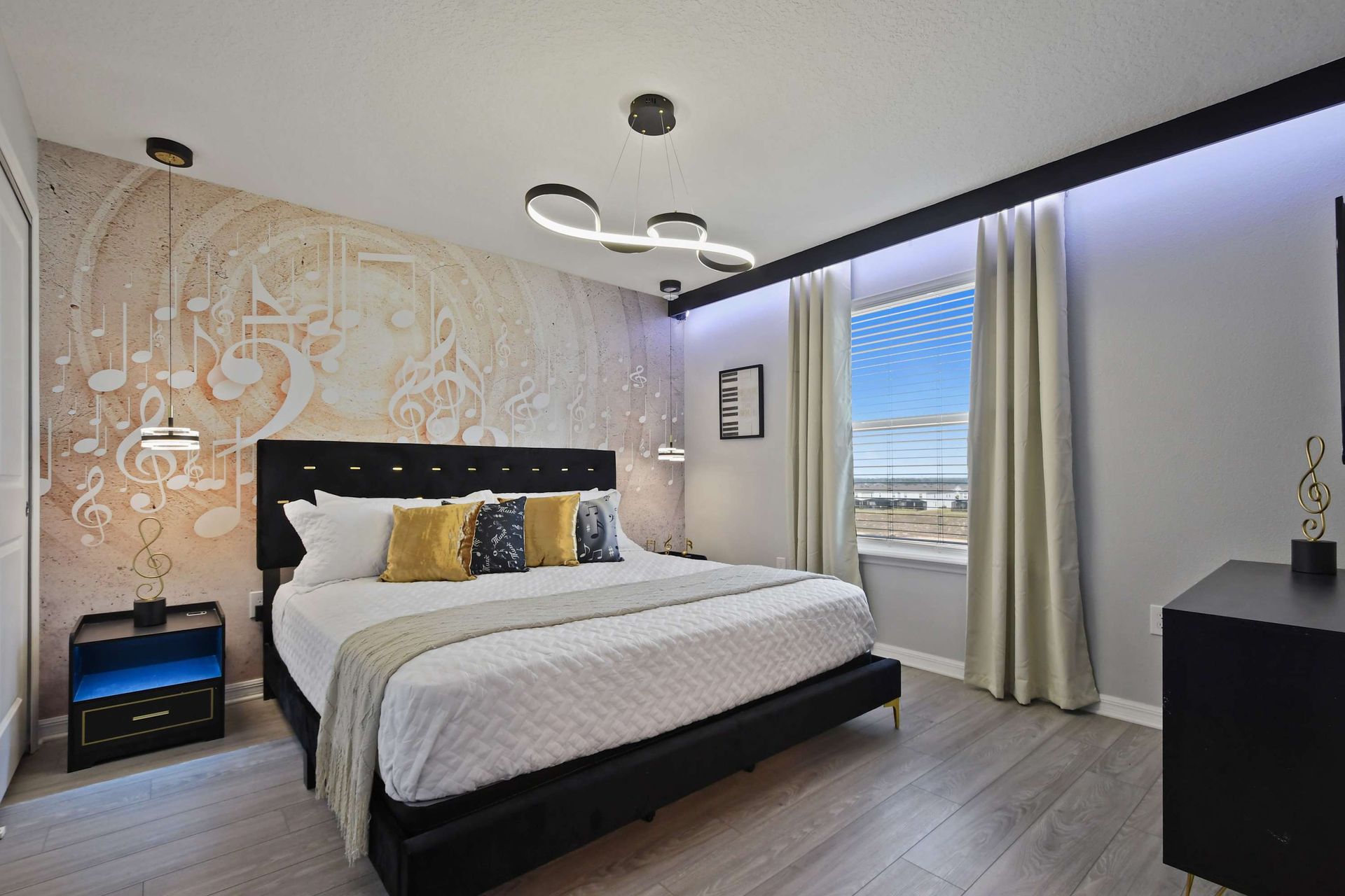 Chic music-inspired suite with gold accents, note-themed decor, and modern flair.