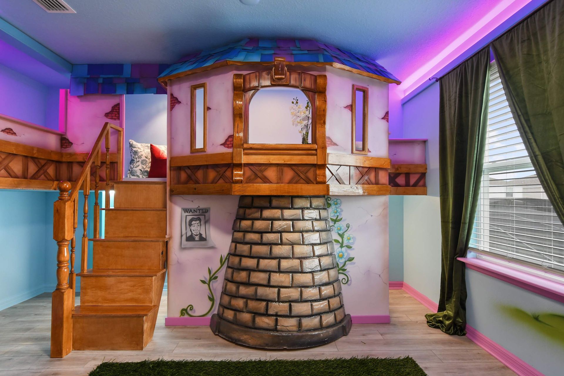 Whimsical Rapunzel tower bedroom with built-in loft, floral mural, and soft LED glow.