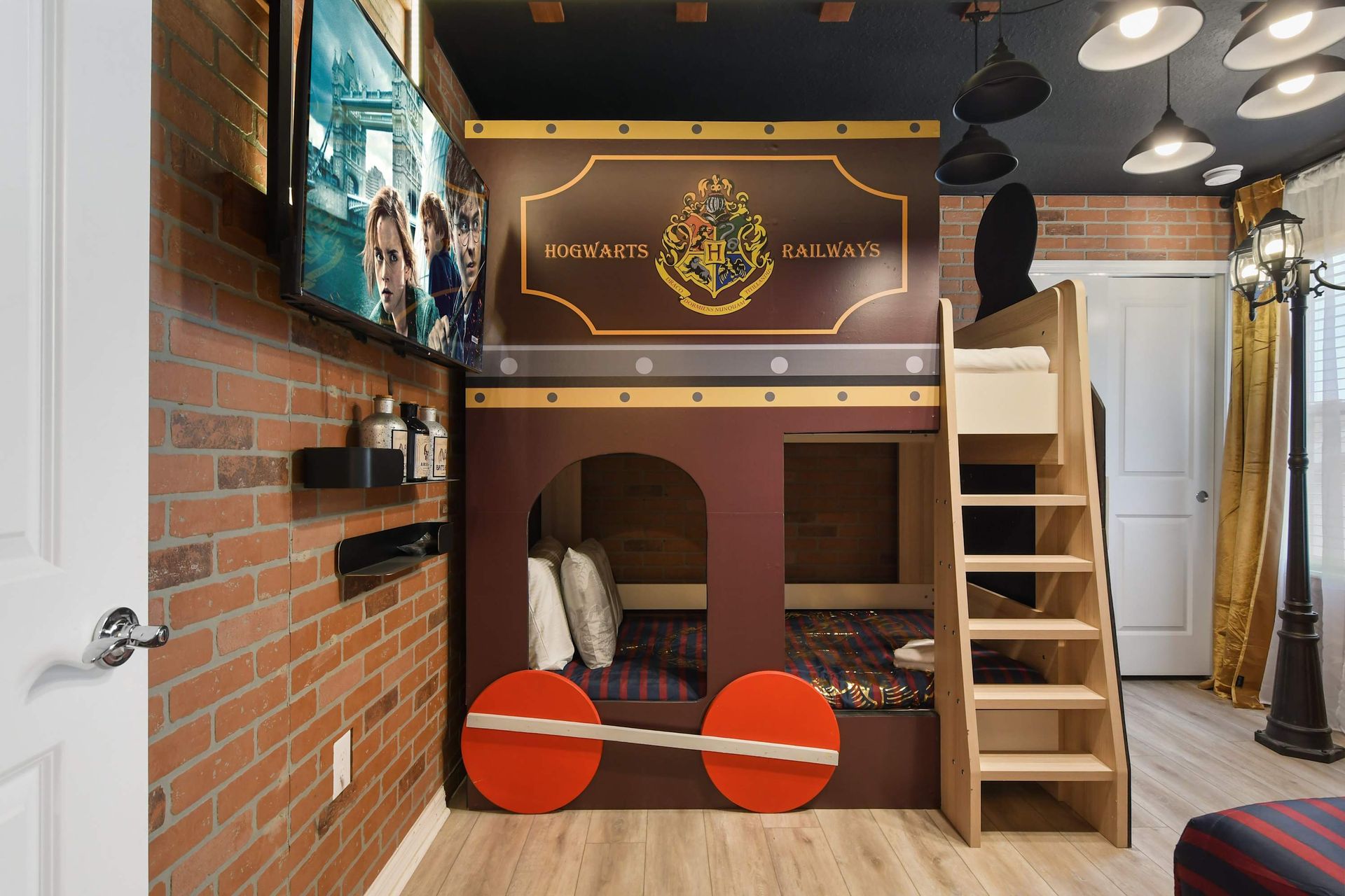 Hogwarts Express bunk bed room with brick walls, themed bedding, and magical details.