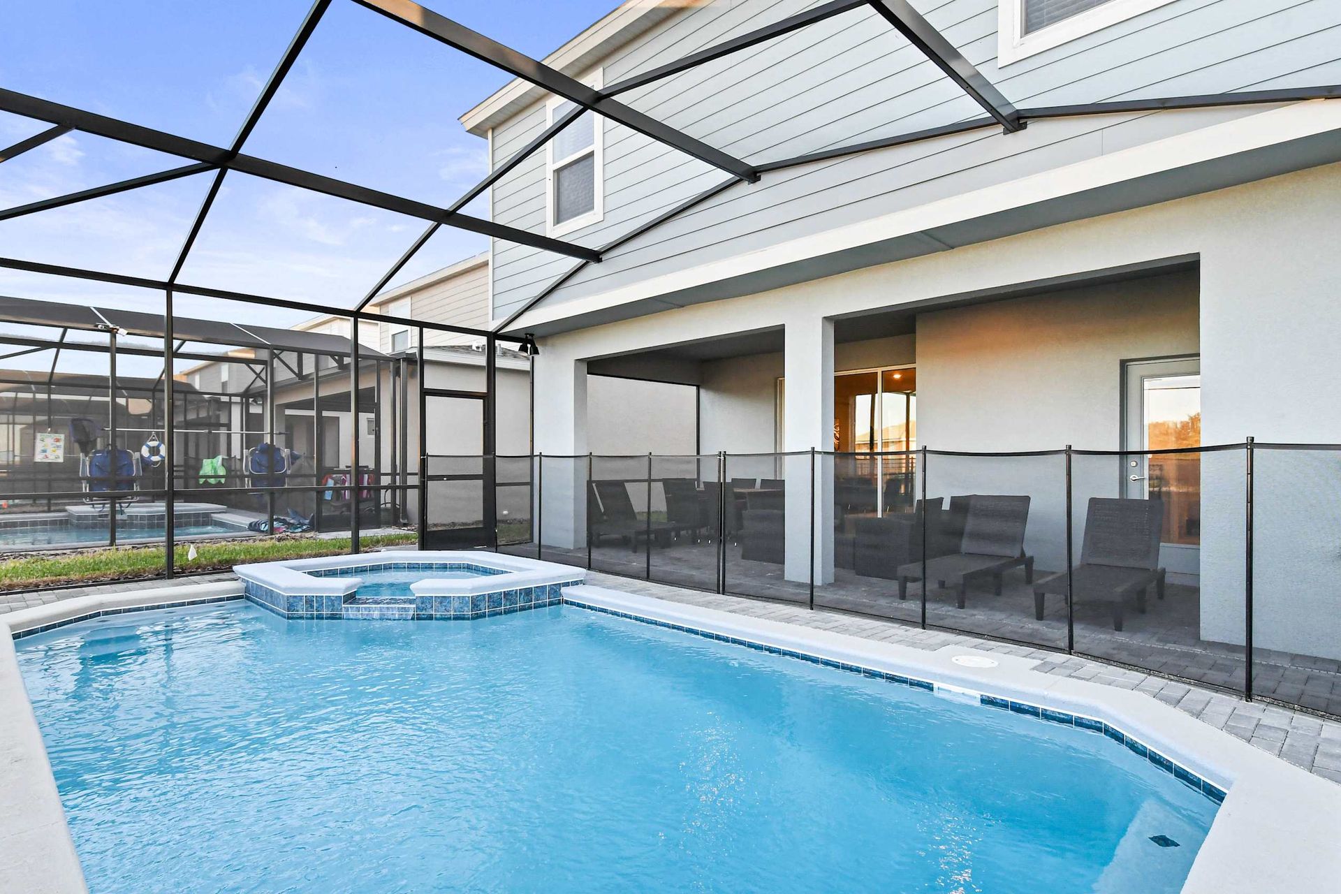Relax in your private screened pool and spa with shaded lounge and dining area.