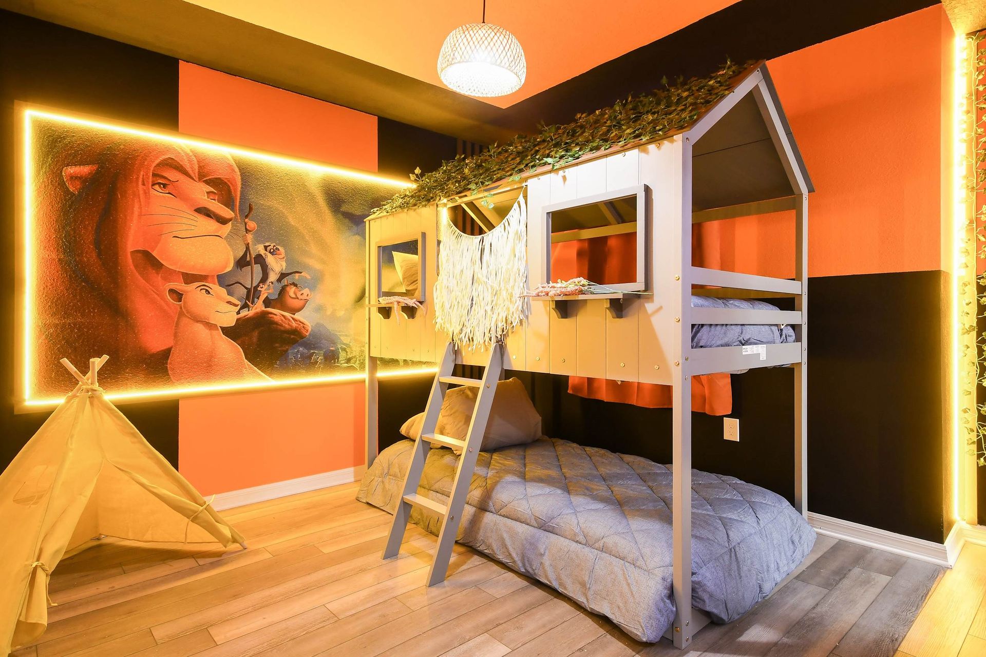 Kids will love the upstairs bedroom with a cool Lion King theme.