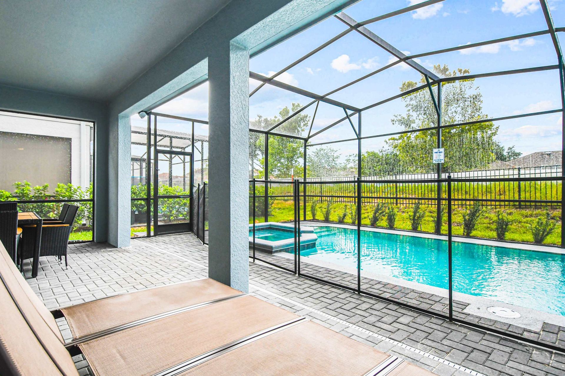 Private screened pool and spa with lounge seating—relax and soak up the sun!