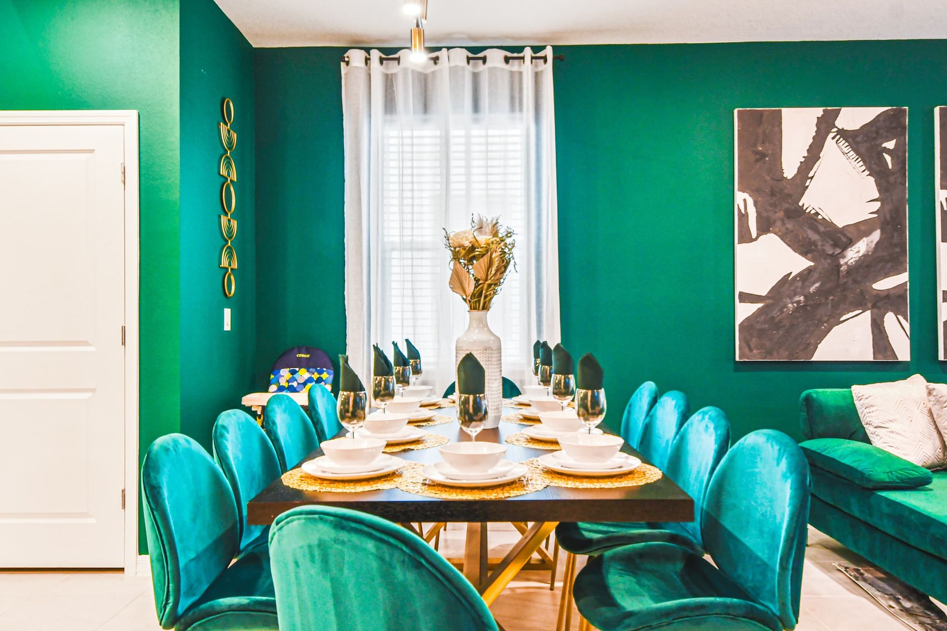 Vibrant dining area with seating for twelve—perfect for stylish family feasts!